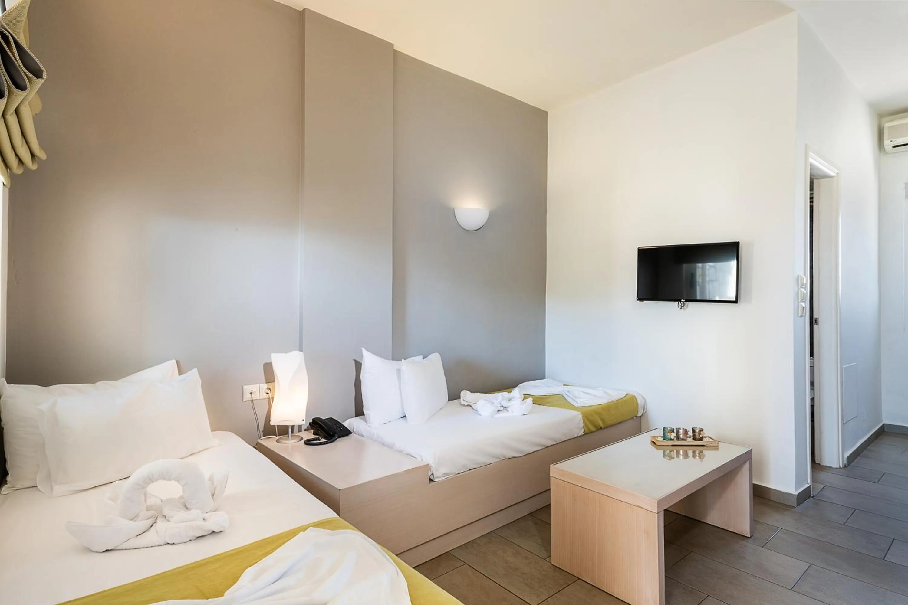 Bed in Kavos Hotel & Suites