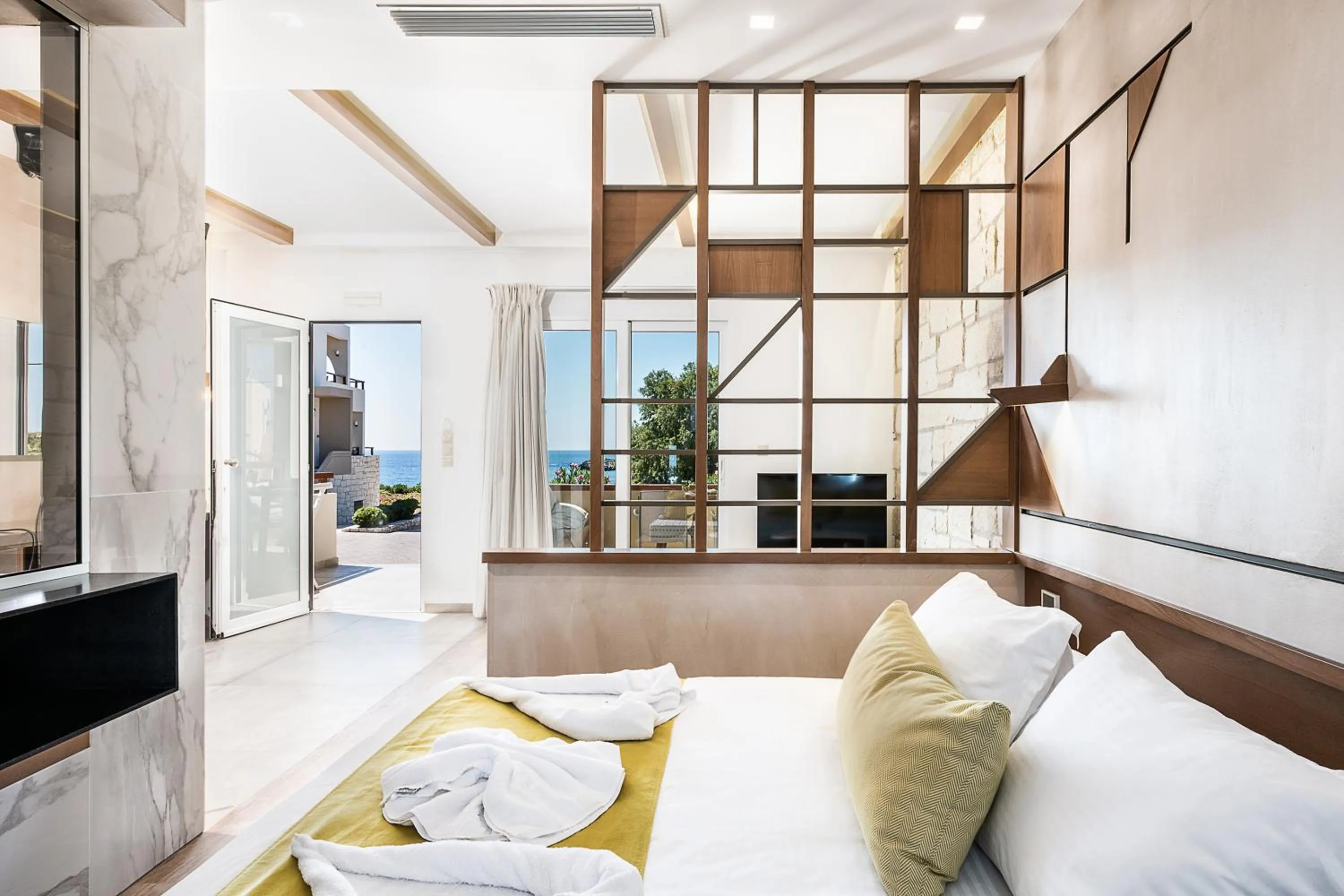 Bed in Kavos Hotel & Suites