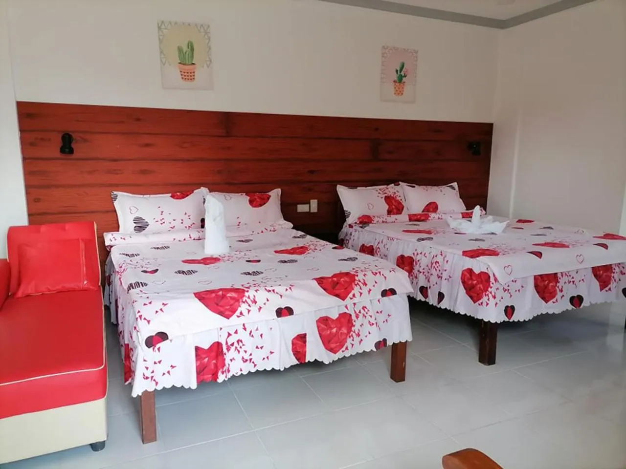 Bedroom, Bed in La Bella Swiss Inn