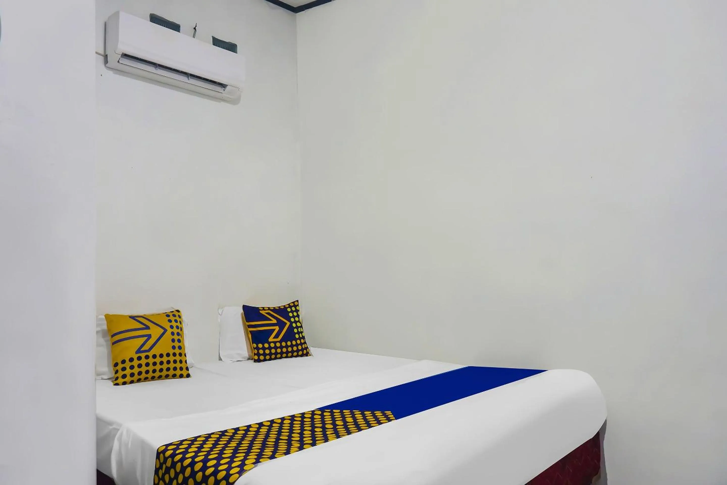 Bedroom in Hotel O Nusasari Guest House