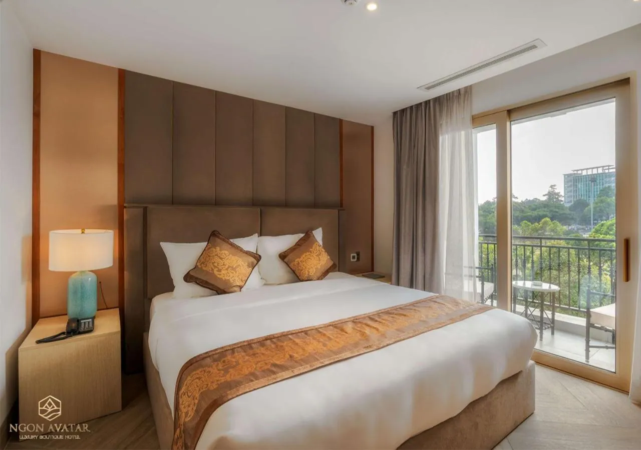 Bed in Ngon Avatar Hotel