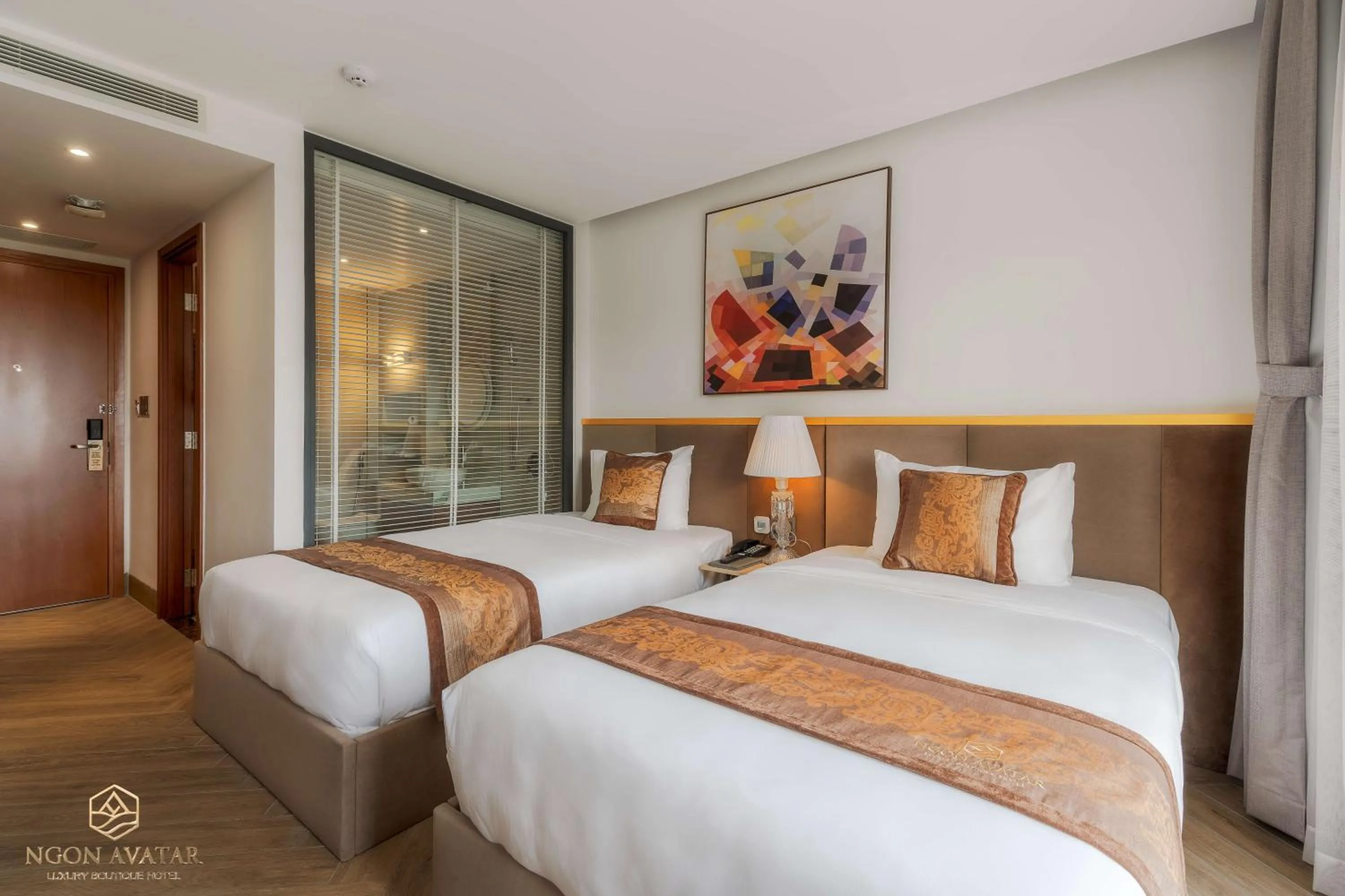 Bed in Ngon Avatar Hotel