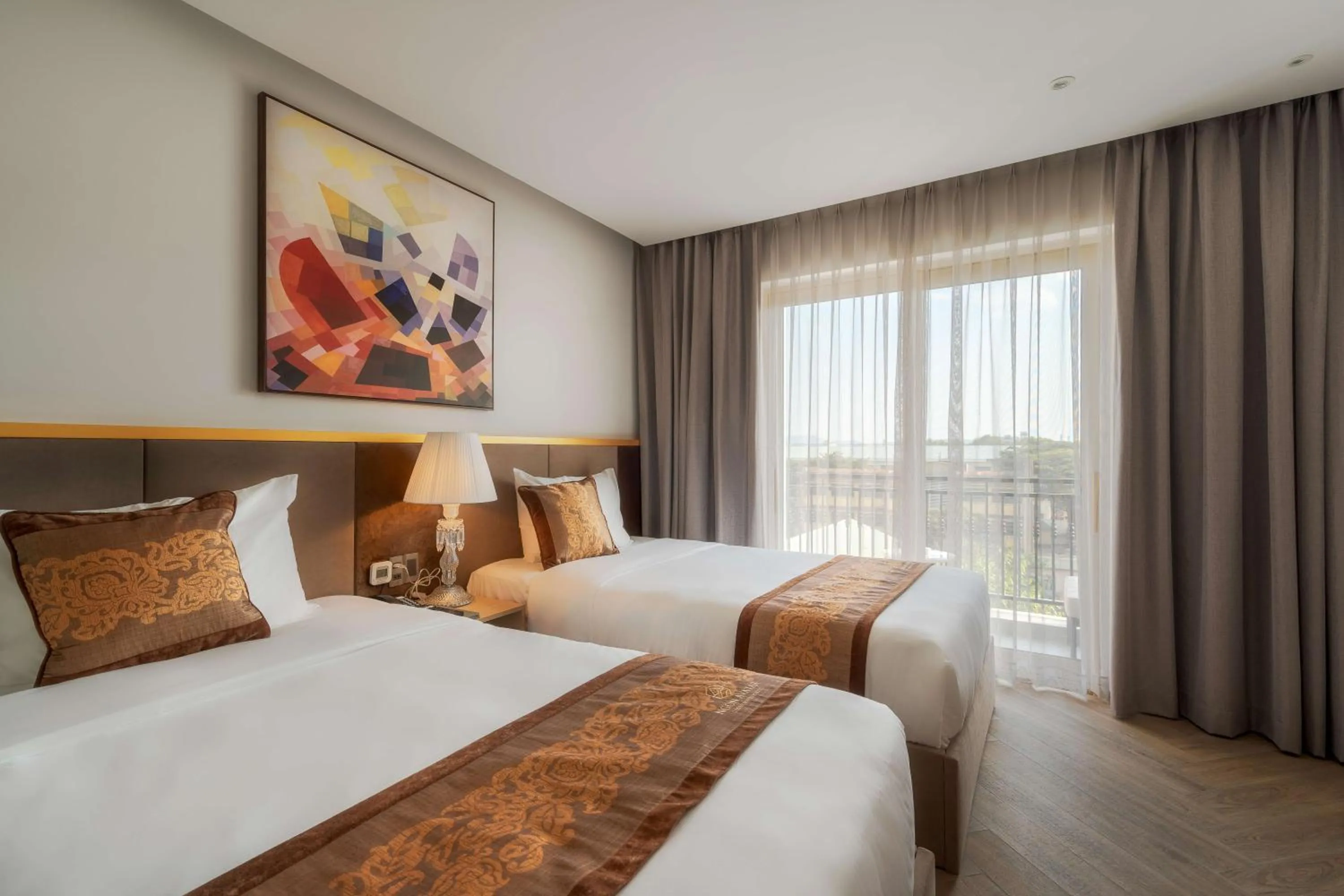 Bed in Ngon Avatar Hotel