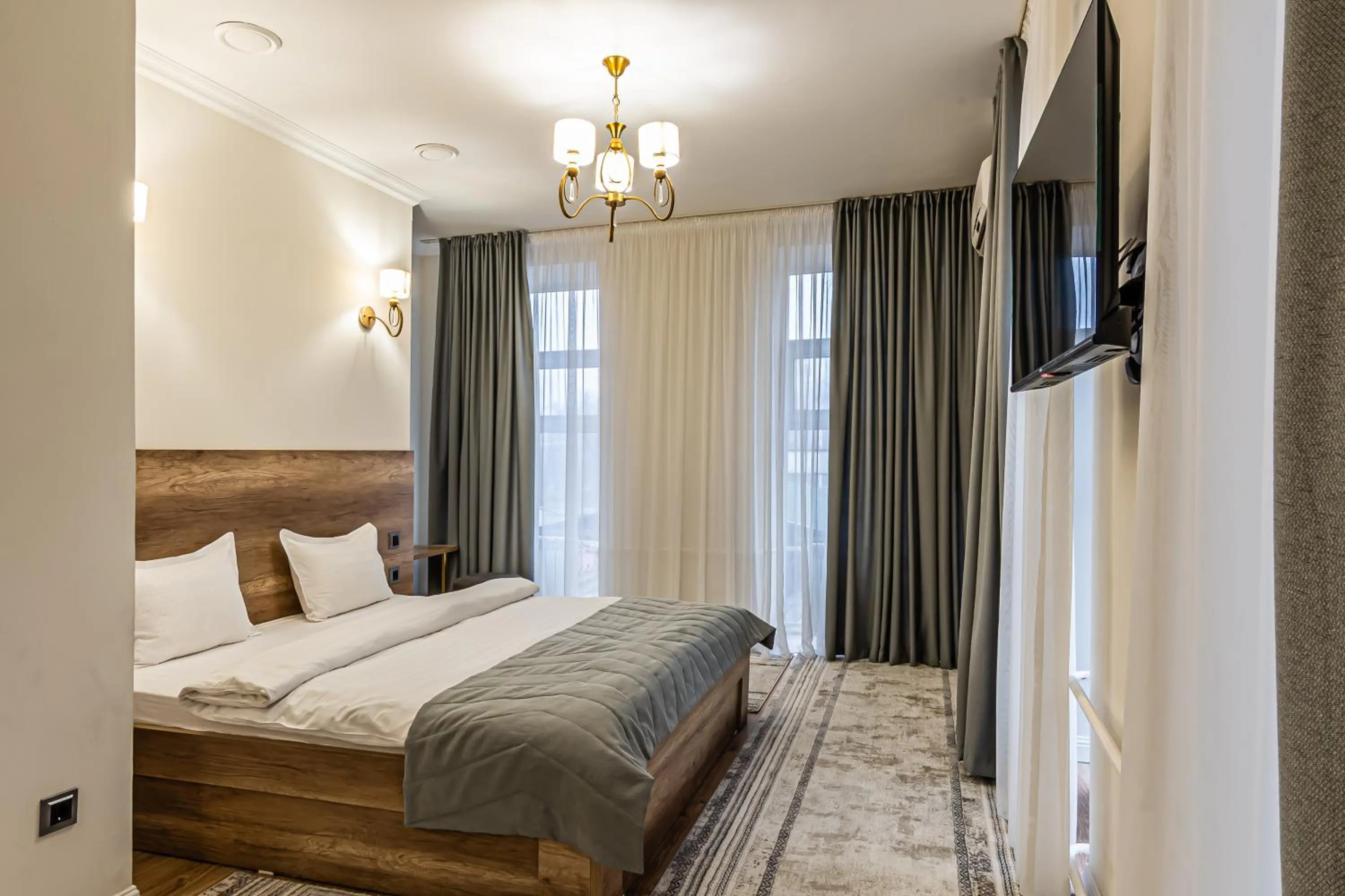 Bed in Oscar Hotel by AG Hotels Group