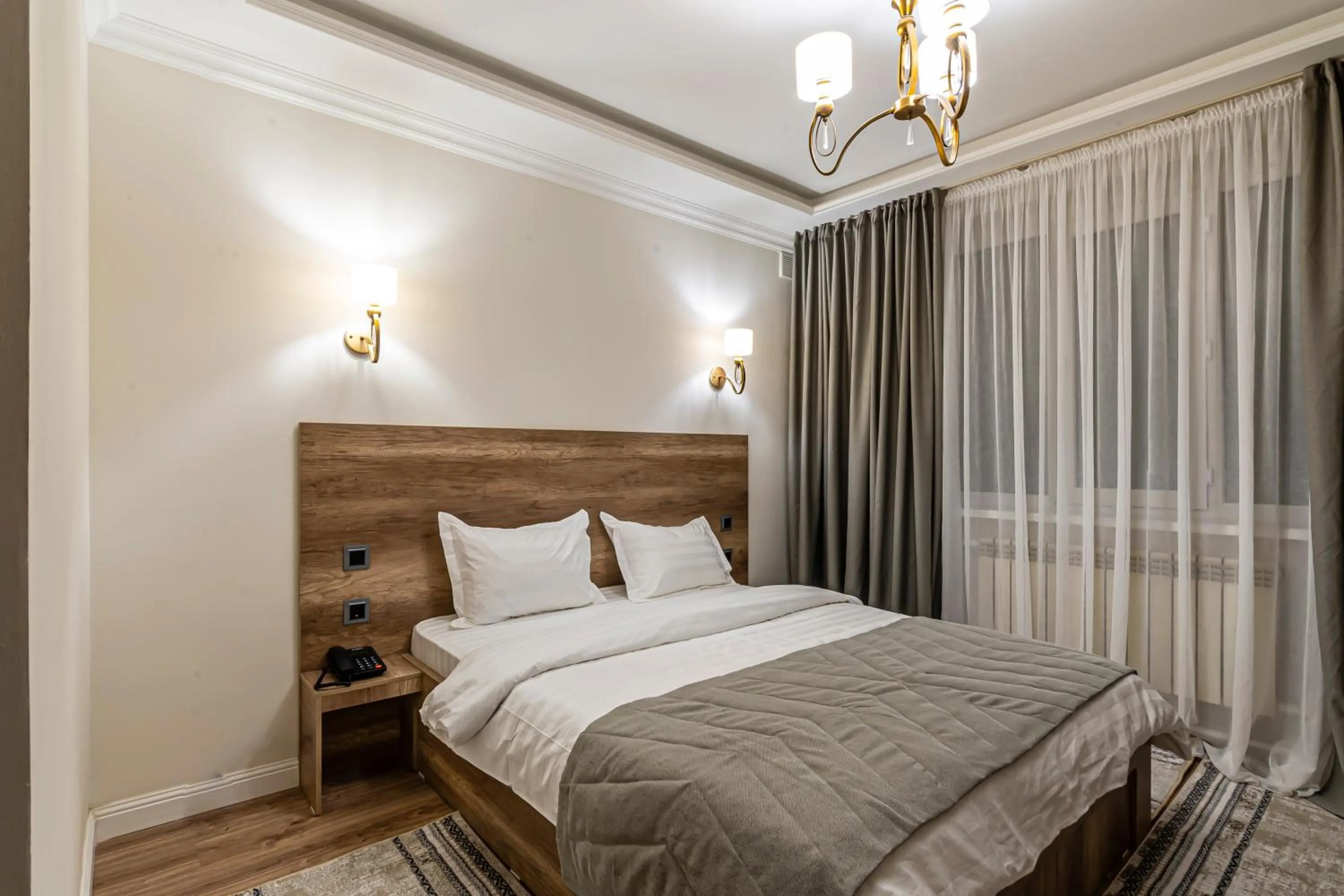 Bed in Oscar Hotel by AG Hotels Group