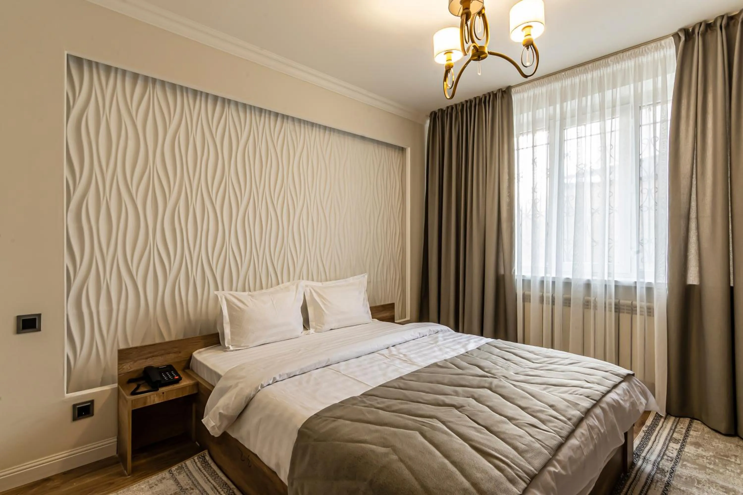 Photo of the whole room, Bed in Oscar Hotel by AG Hotels Group