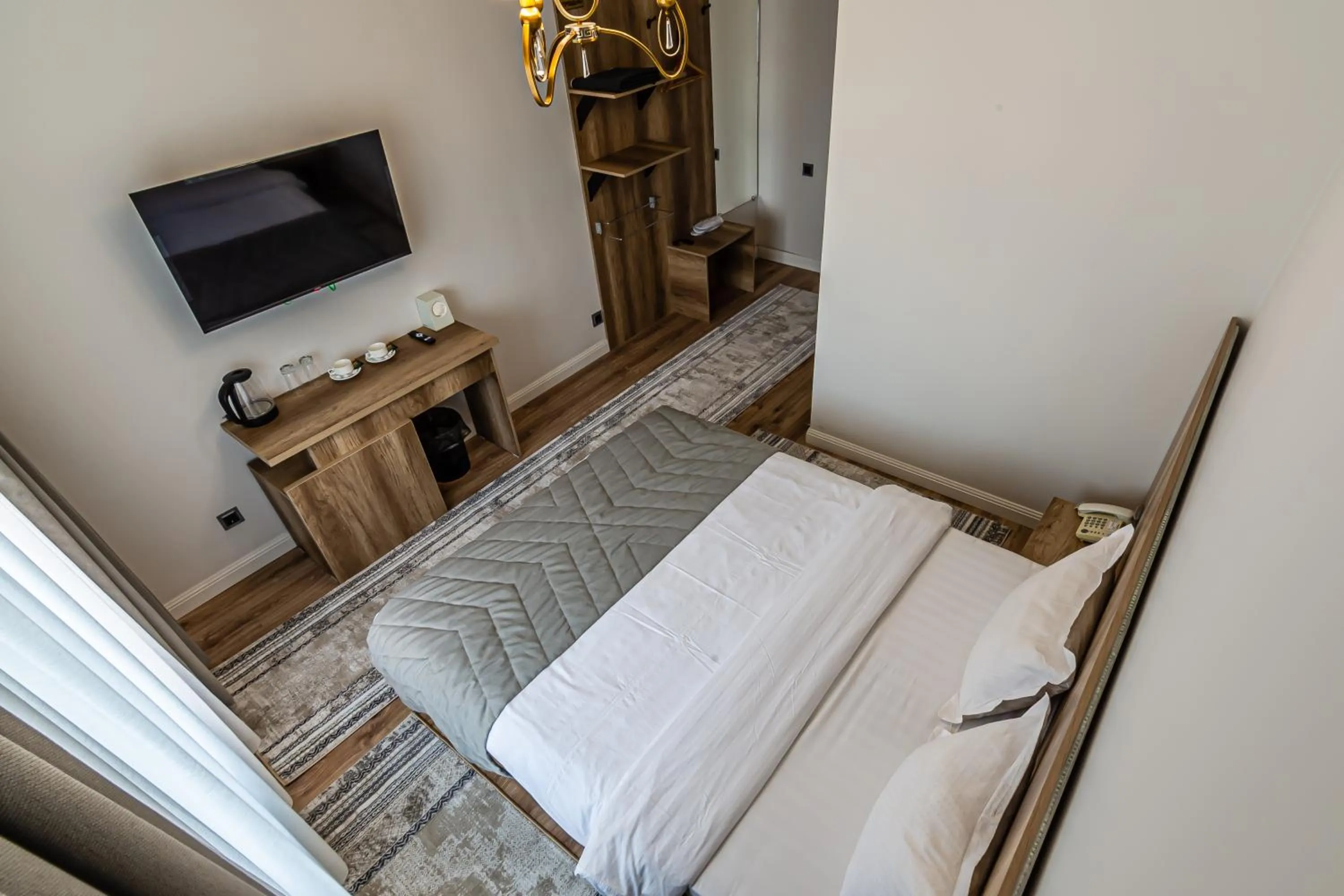 Photo of the whole room, Bed in Oscar Hotel by AG Hotels Group