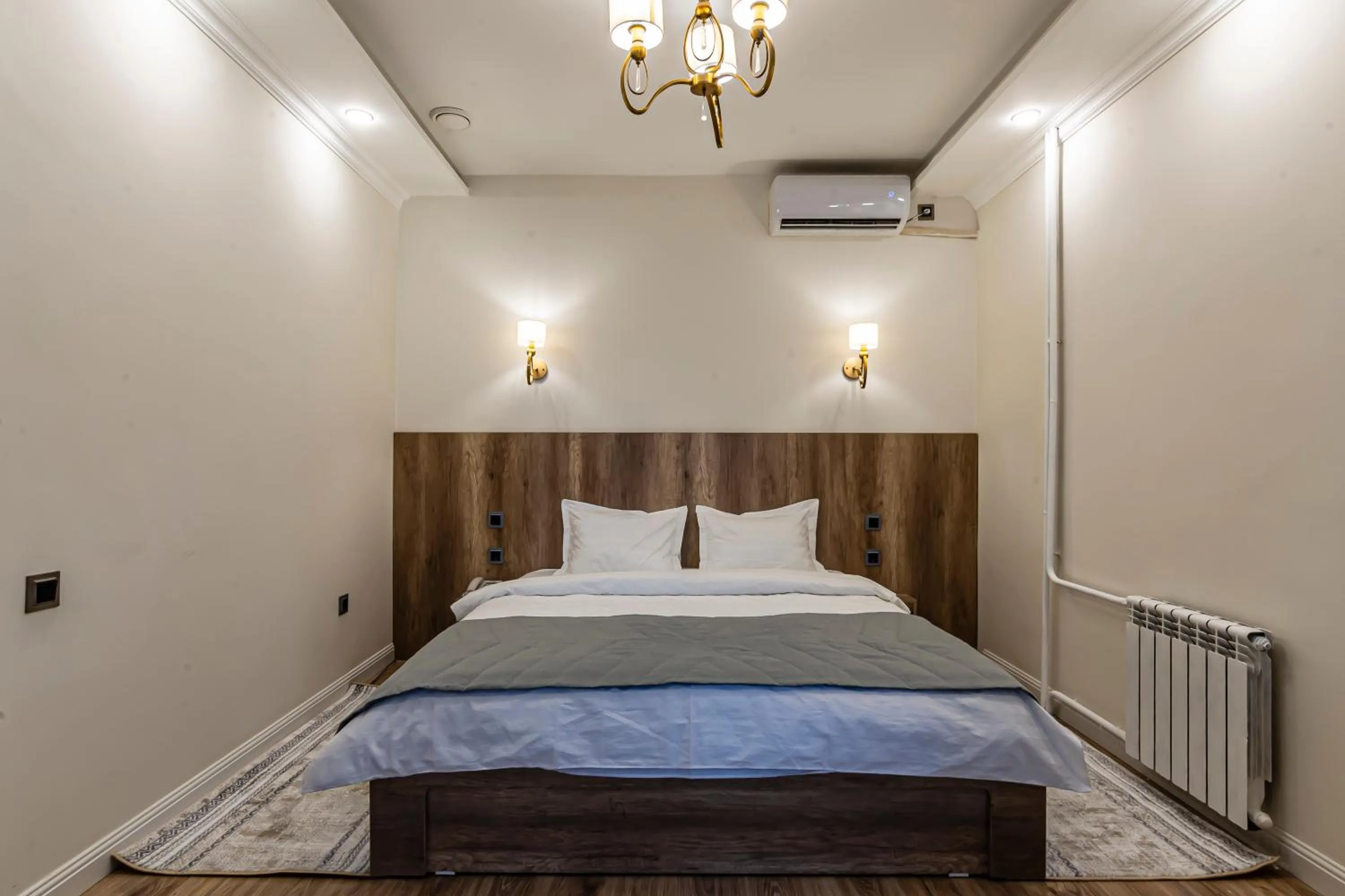 Bed in Oscar Hotel by AG Hotels Group
