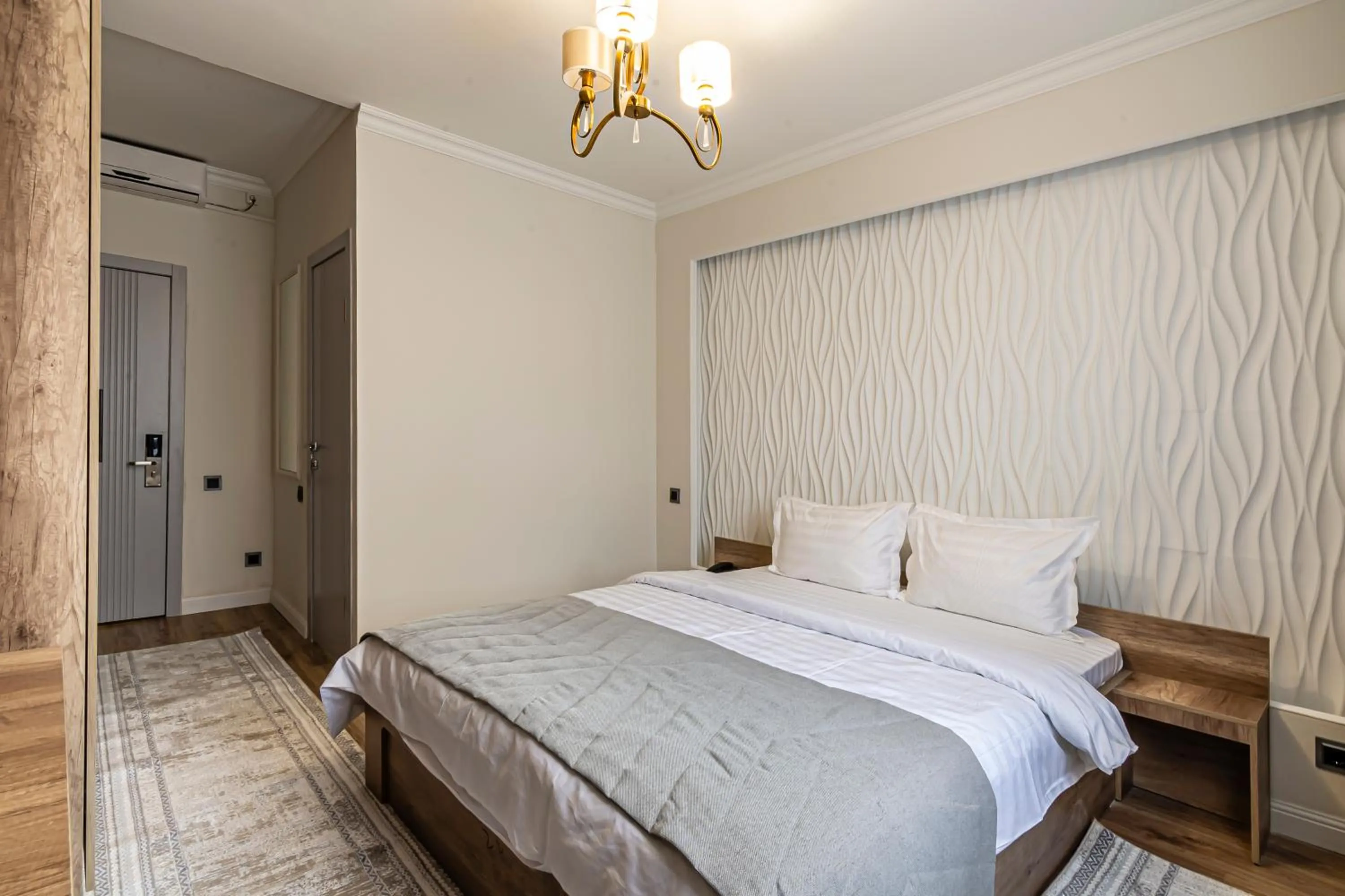 Bed in Oscar Hotel by AG Hotels Group