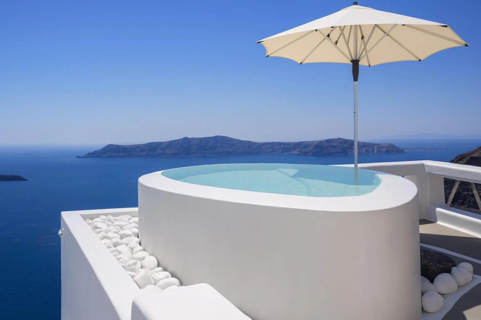 Hot Spring Bath in Chic Hotel Santorini