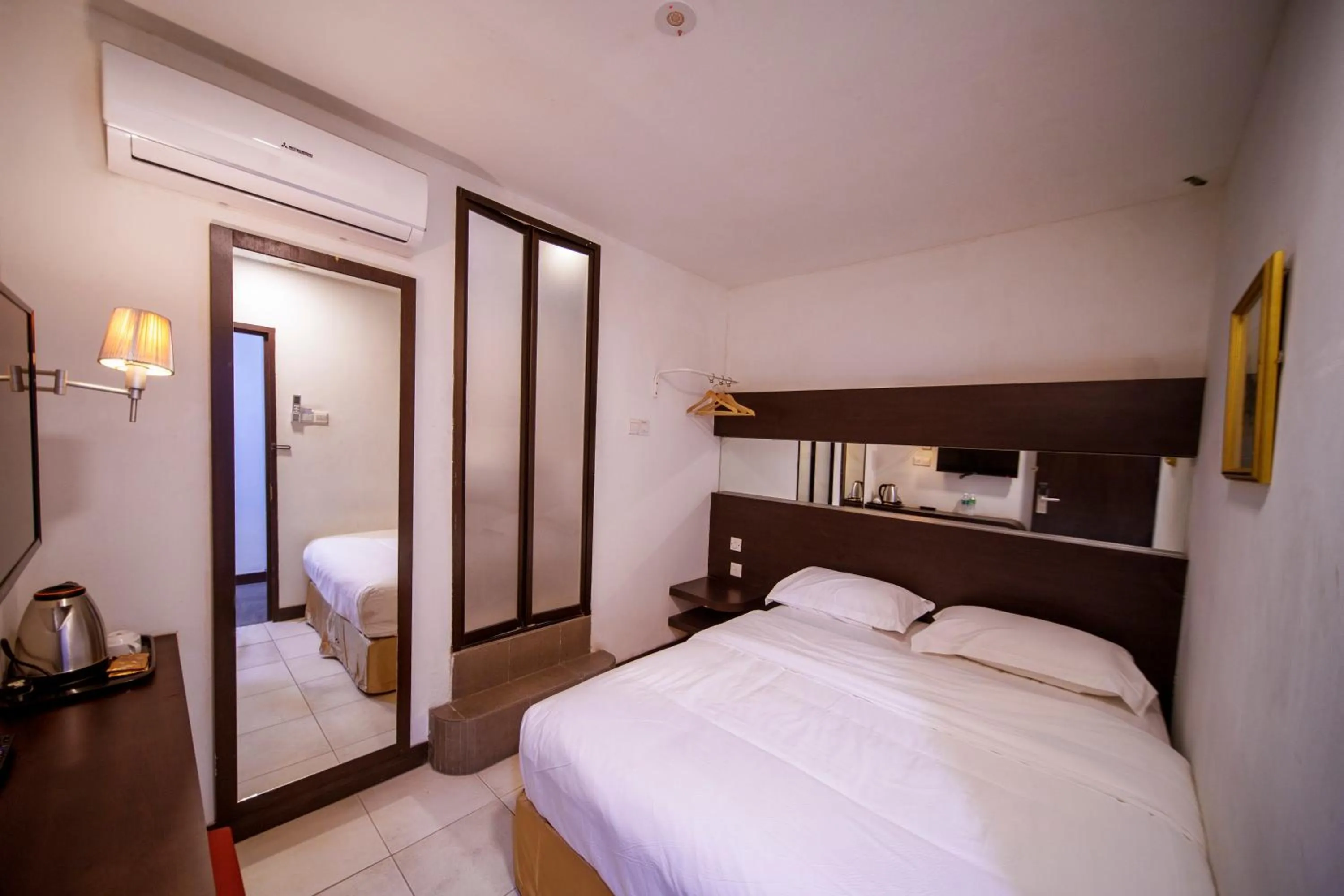 Bed in Uptown Chinatown