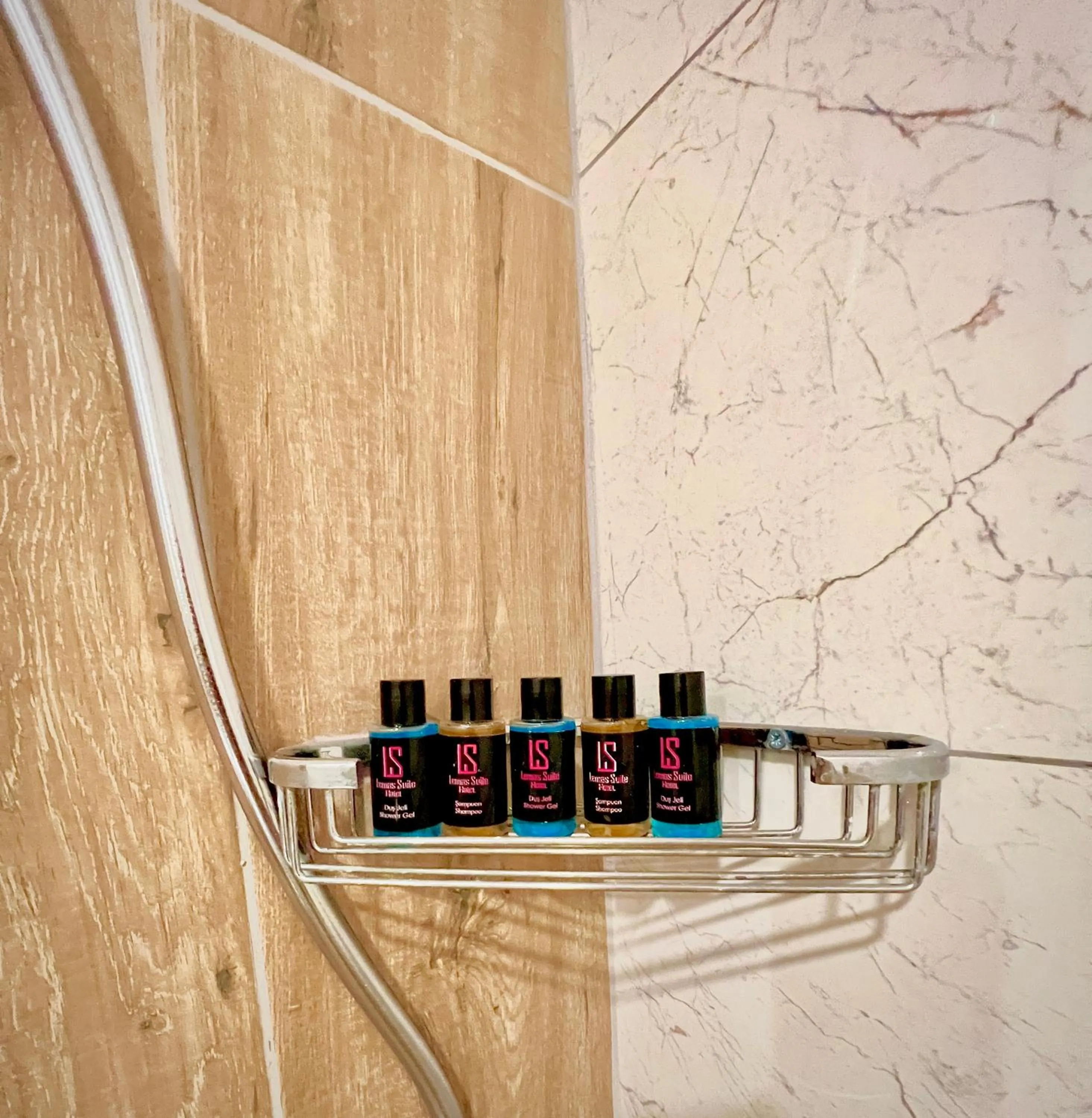 Bathroom in LEMAS SUITE HOTEL