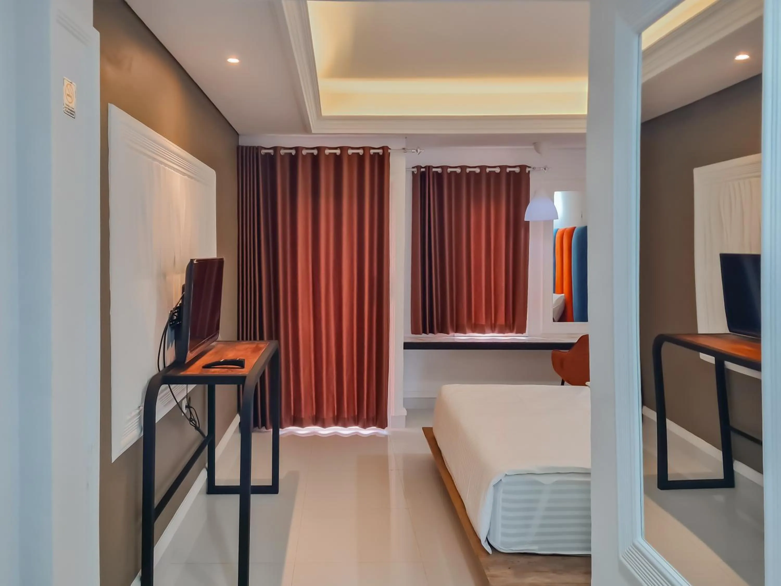 Bedroom, Bed in Sans Hotel Grand Sabaraya Cikampek