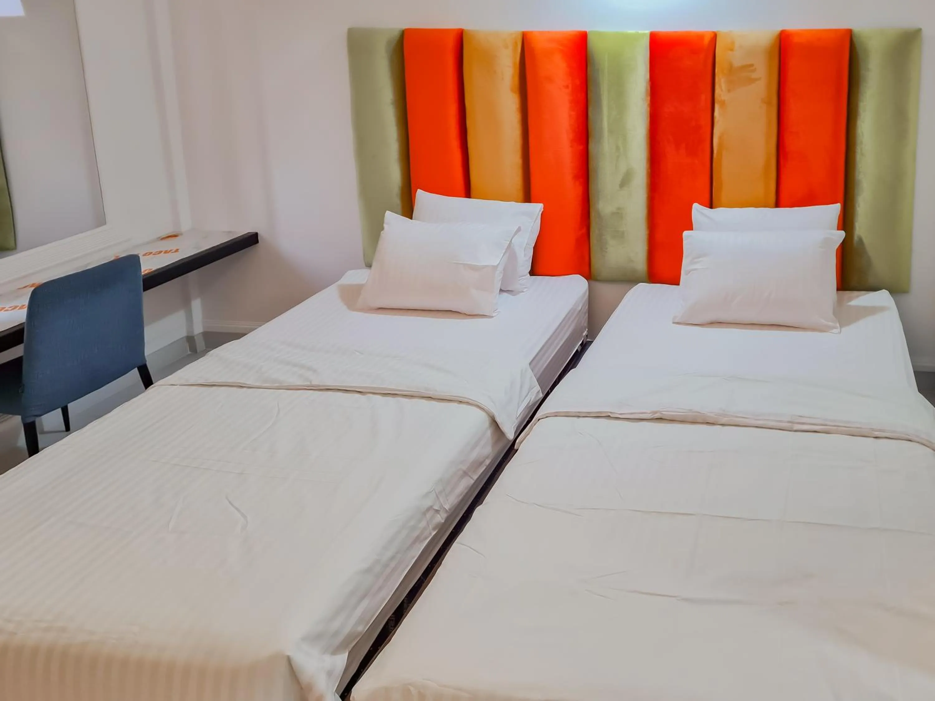 Bedroom, Bed in Sans Hotel Grand Sabaraya Cikampek