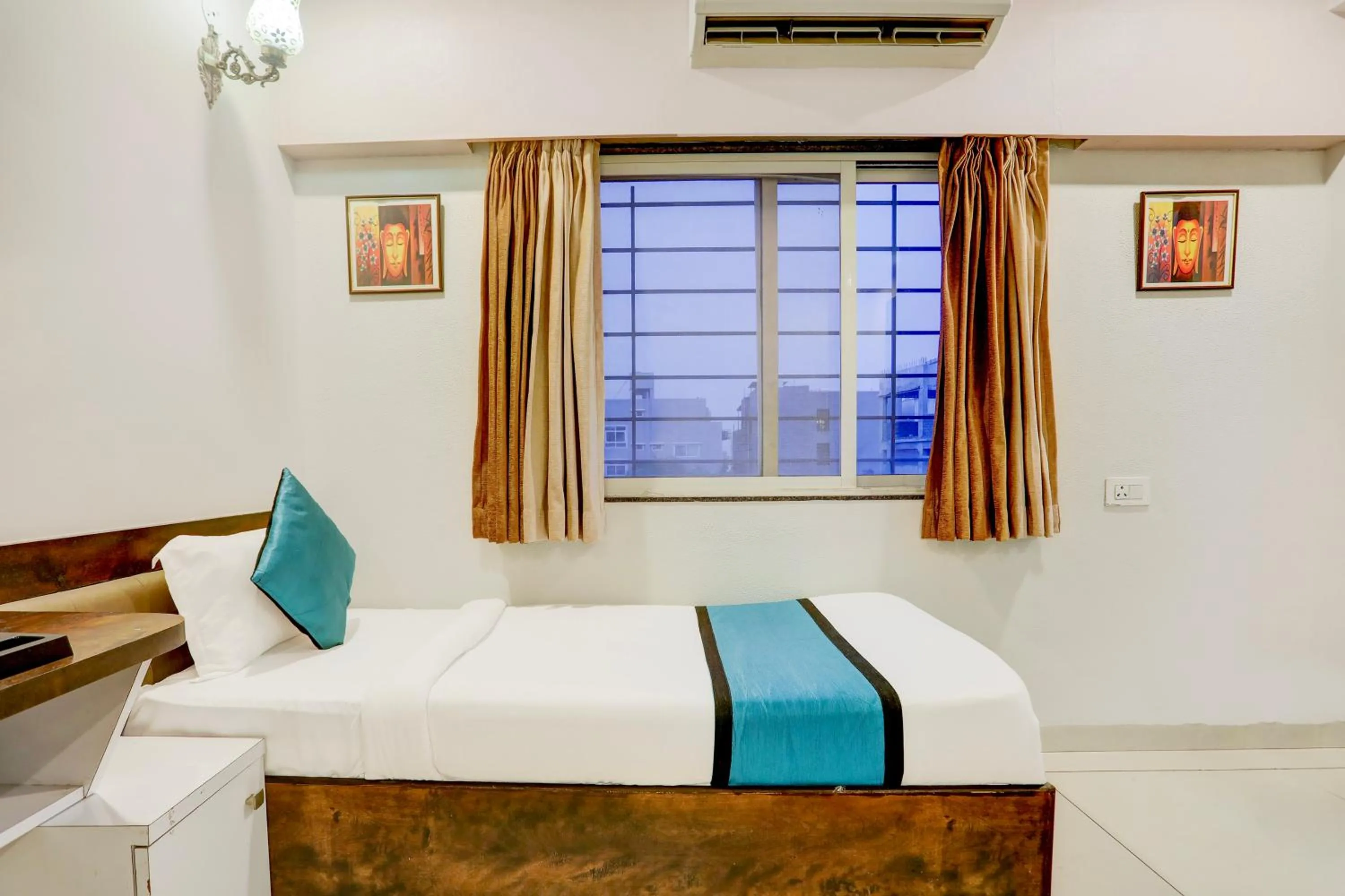 Bed in The Byke Business Hotel - Signature Planet Vijay Nagar