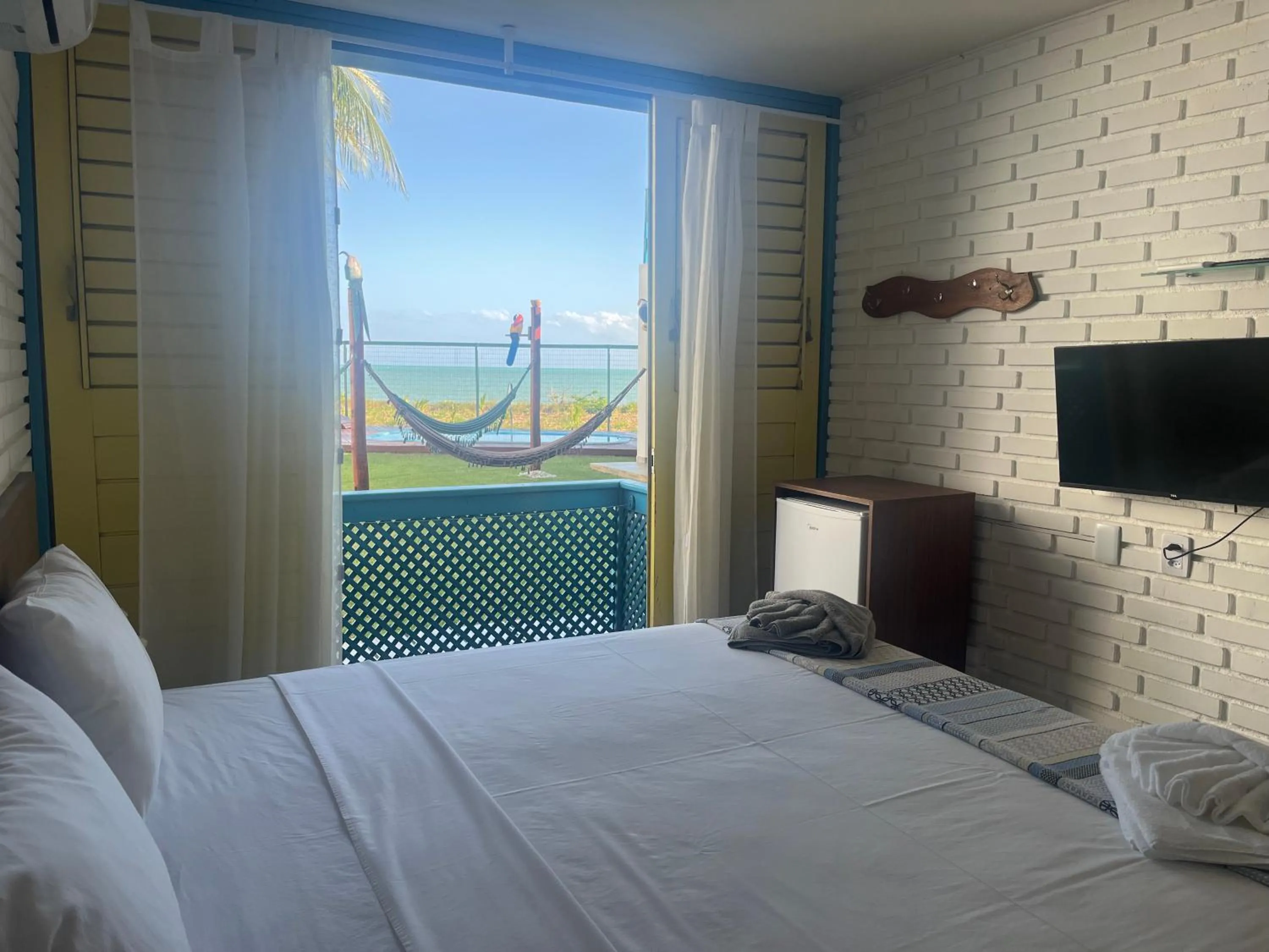 Bed in Manaí Pousada & Beach Club