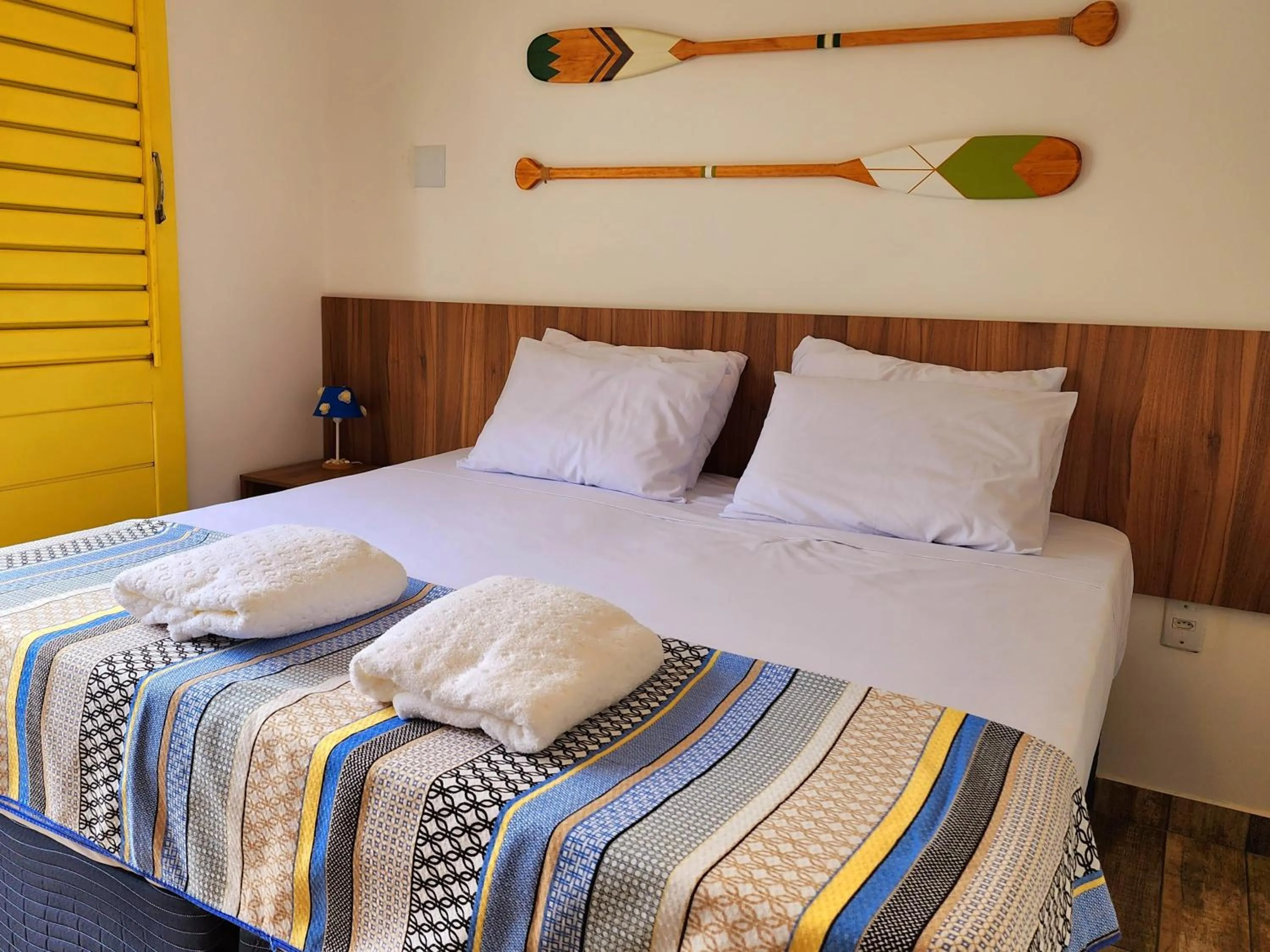 Bed in Manaí Pousada & Beach Club