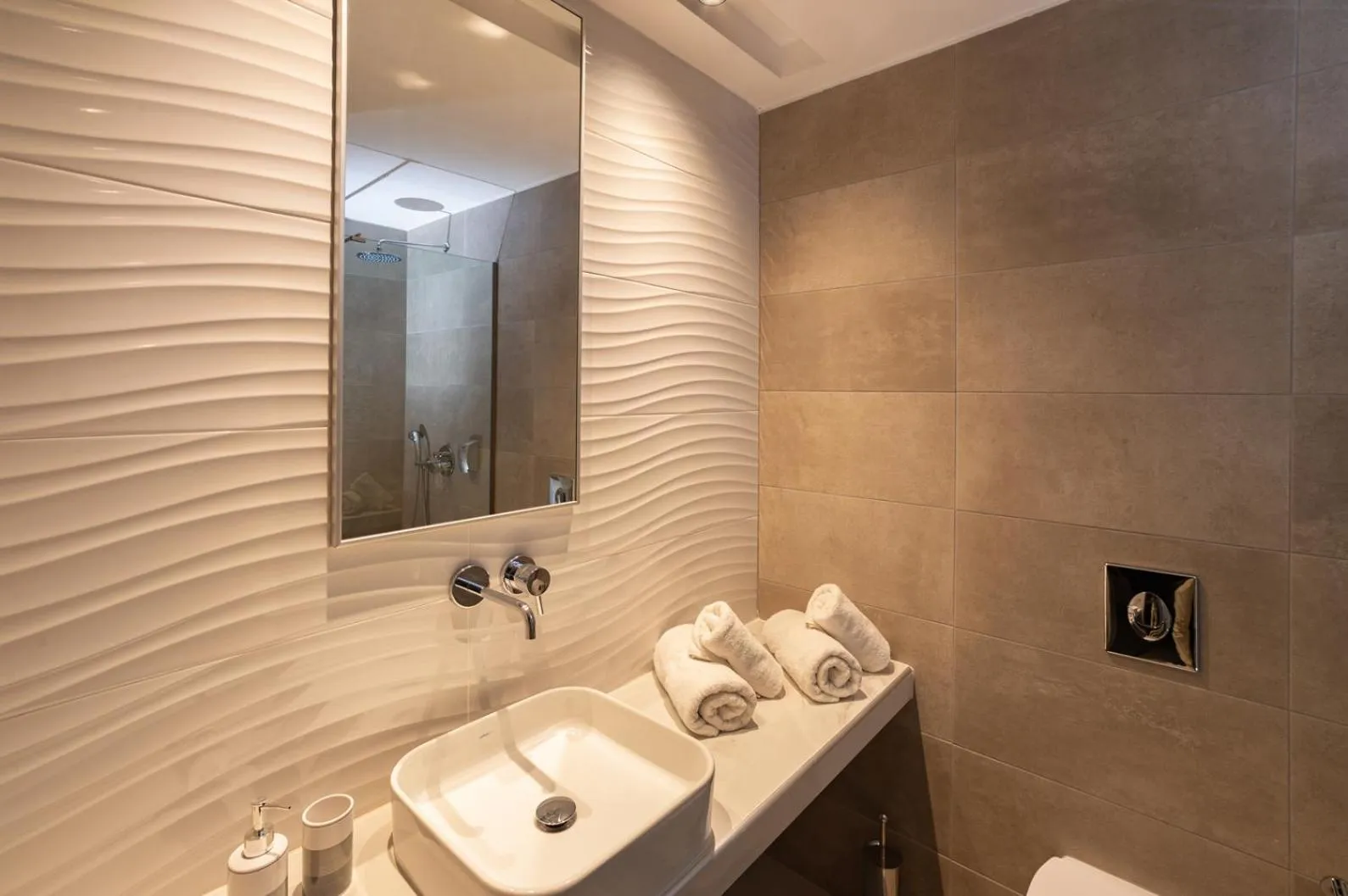 Bathroom in Zoes Hotel & Suites