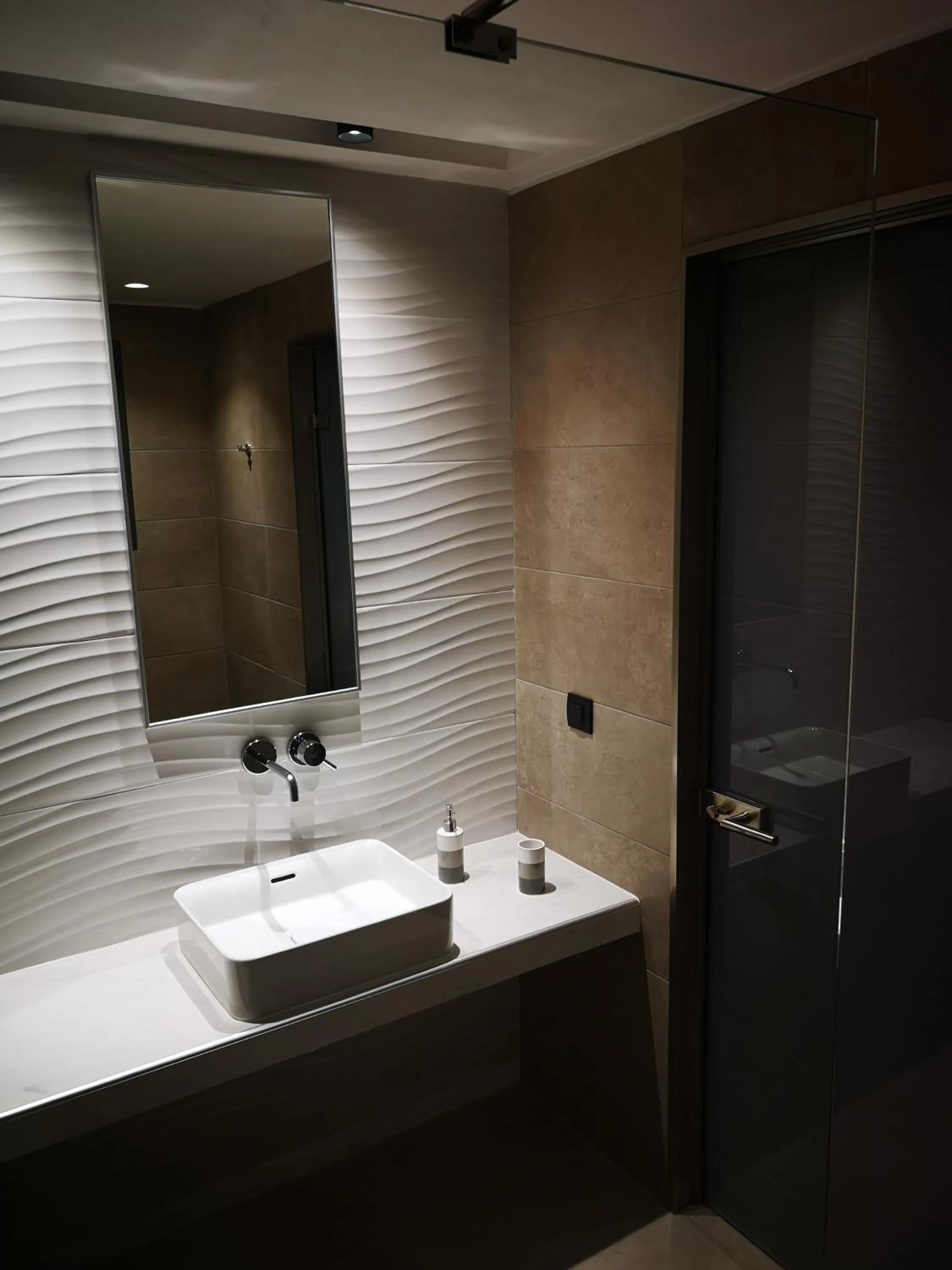 Bathroom in Zoes Hotel & Suites