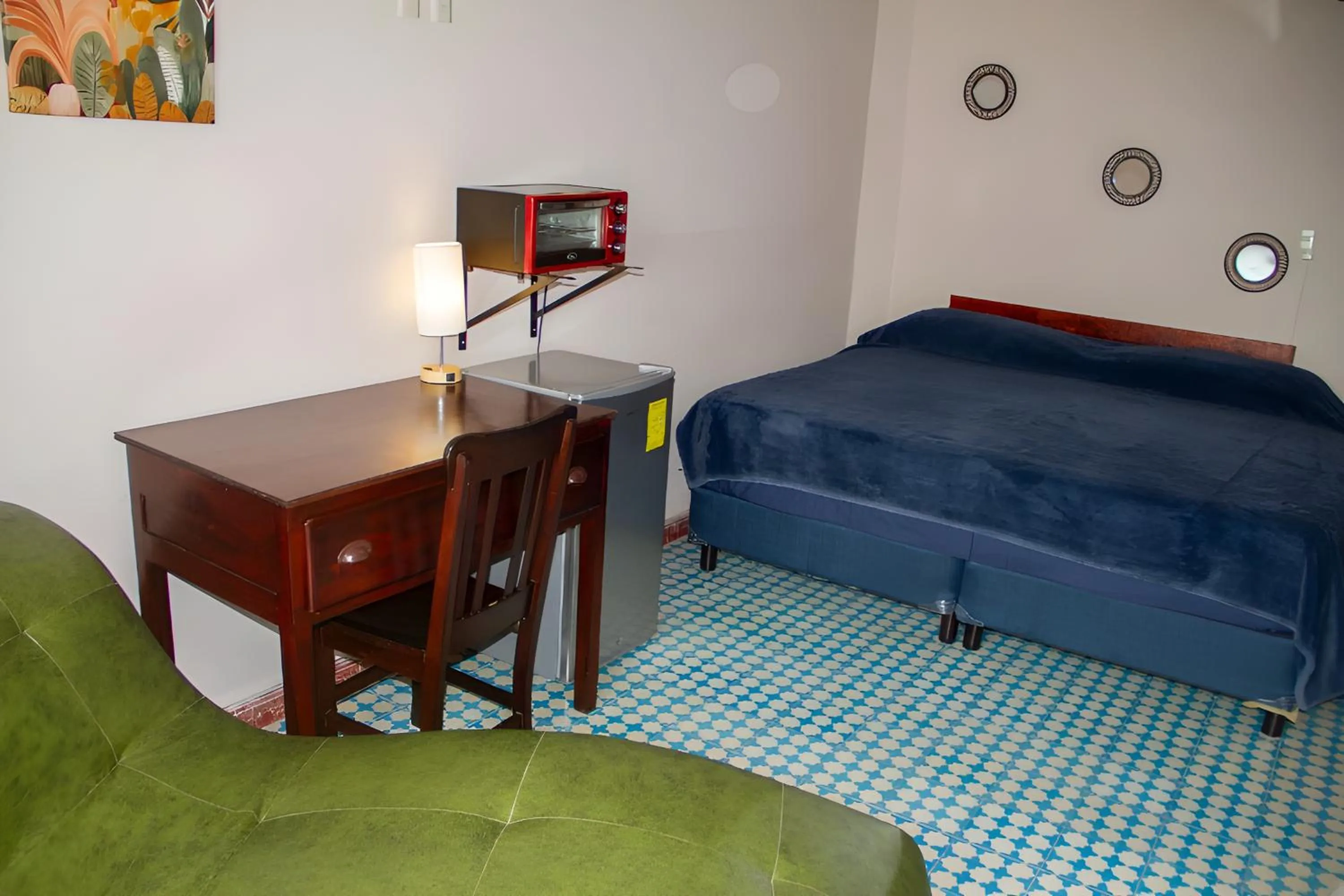 Seating area, Bed in Hotel Cortaza Galería