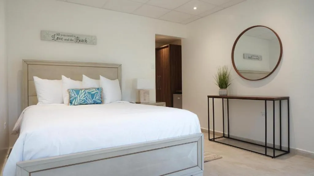 Bed in Tres Palmas Boutique Hotel