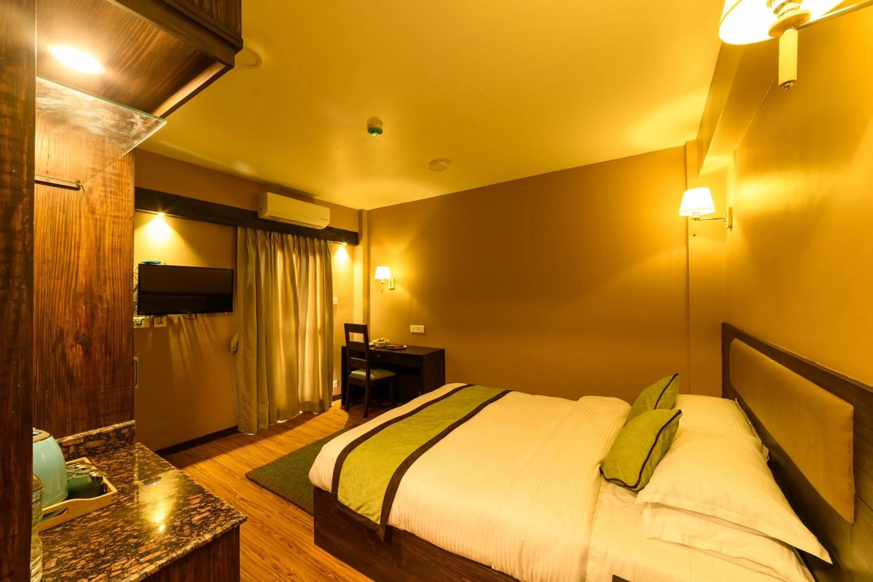 Bed in Purna's Museum Resort