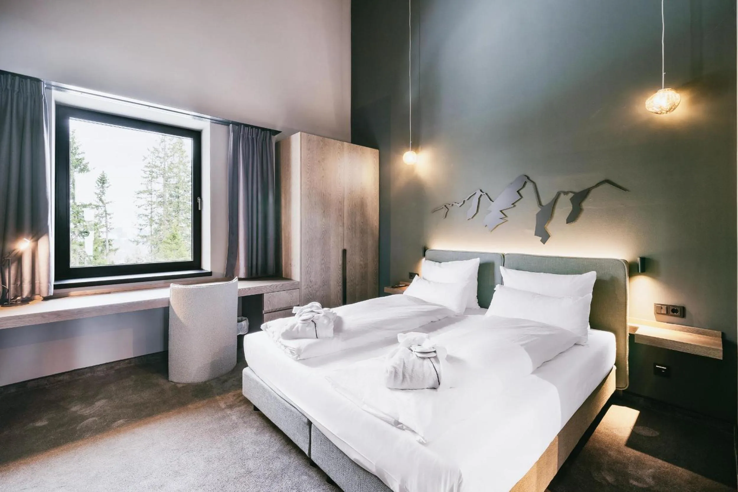 Photo of the whole room, Bed in TRIFORÊT alpin resort