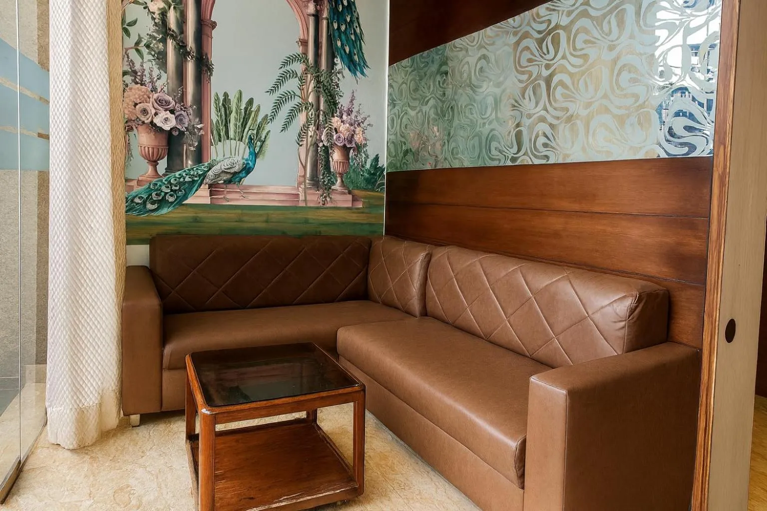 Seating area in Hotel Good Luck by JMD Group