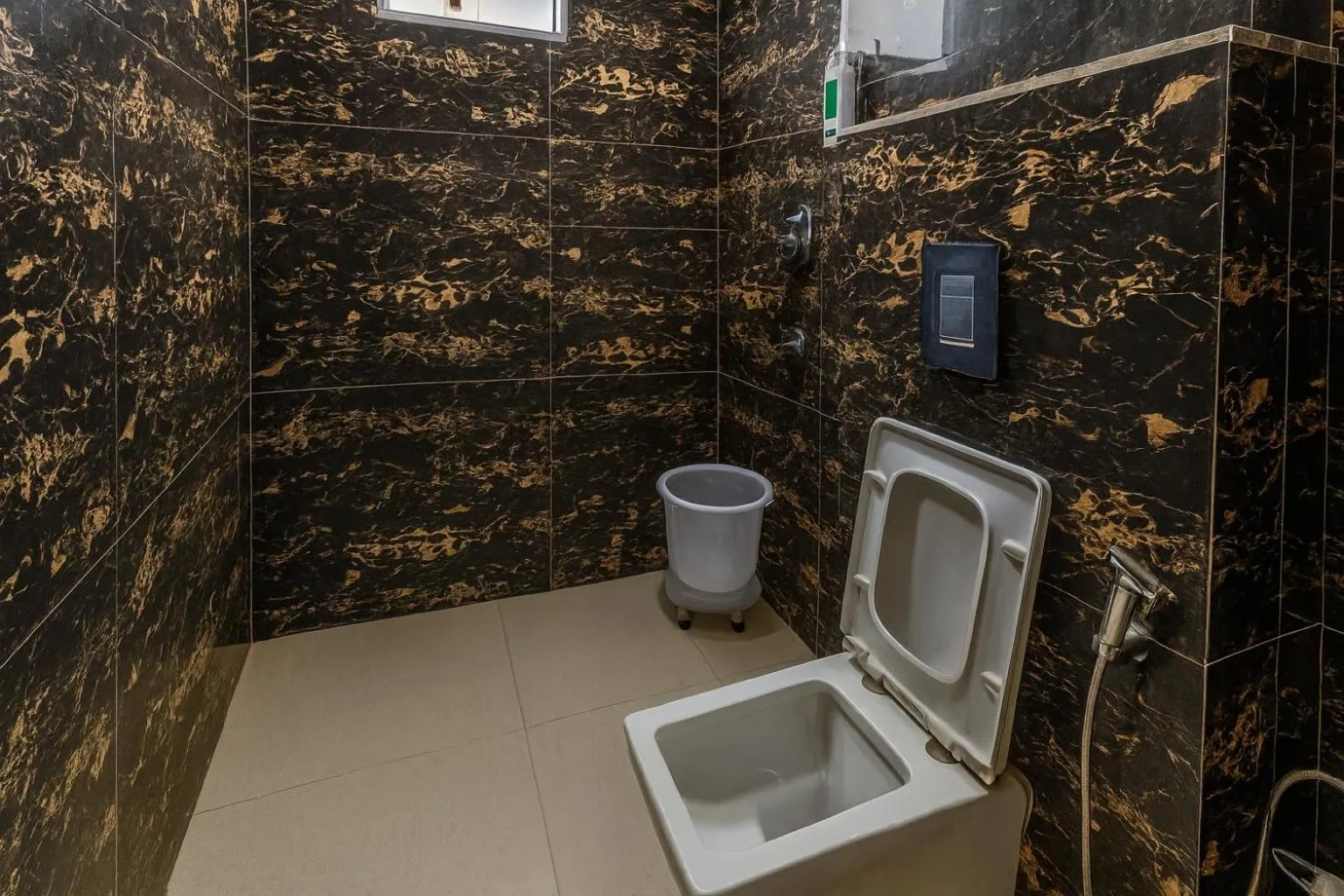 Bathroom in Hotel Good Luck by JMD Group