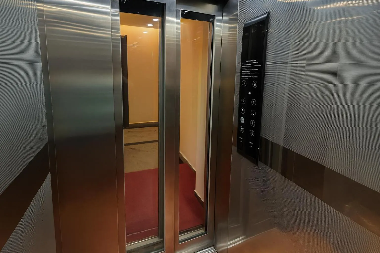 elevator in Hotel Good Luck by JMD Group