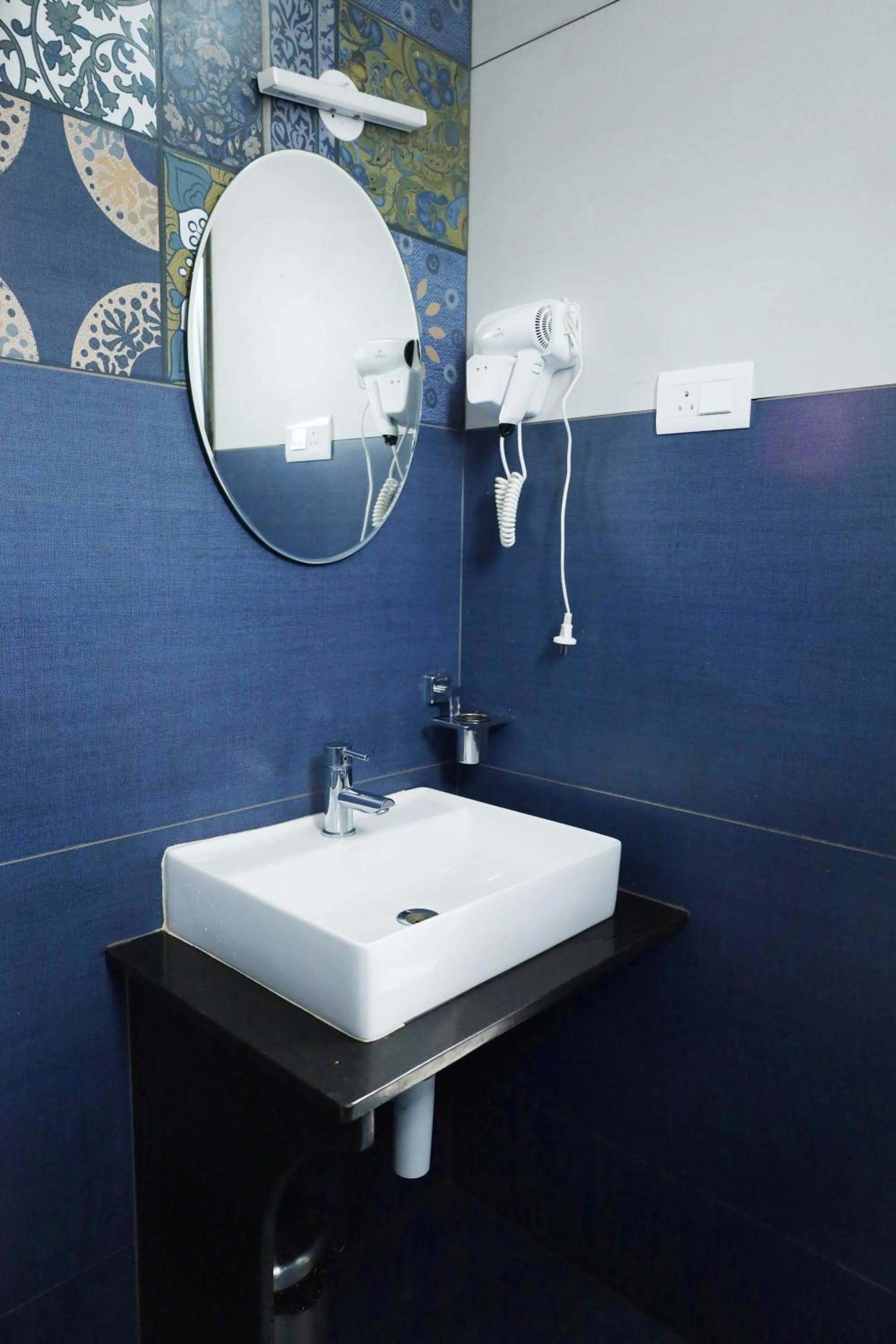 Bathroom in Felix Inn - Manyata Tech Park