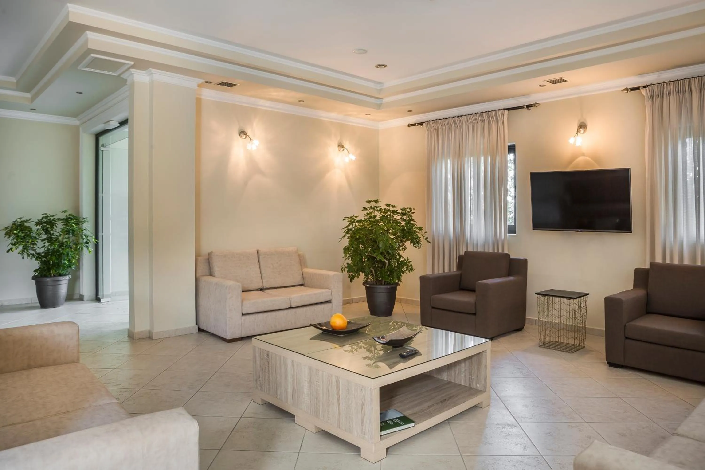 Communal lounge/ TV room in Limanaki Hotel