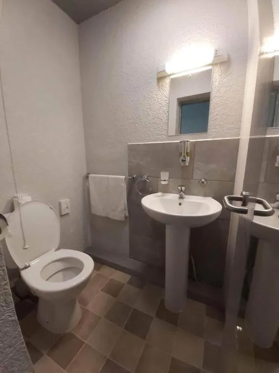 Bathroom in OYO Ivy Hotel