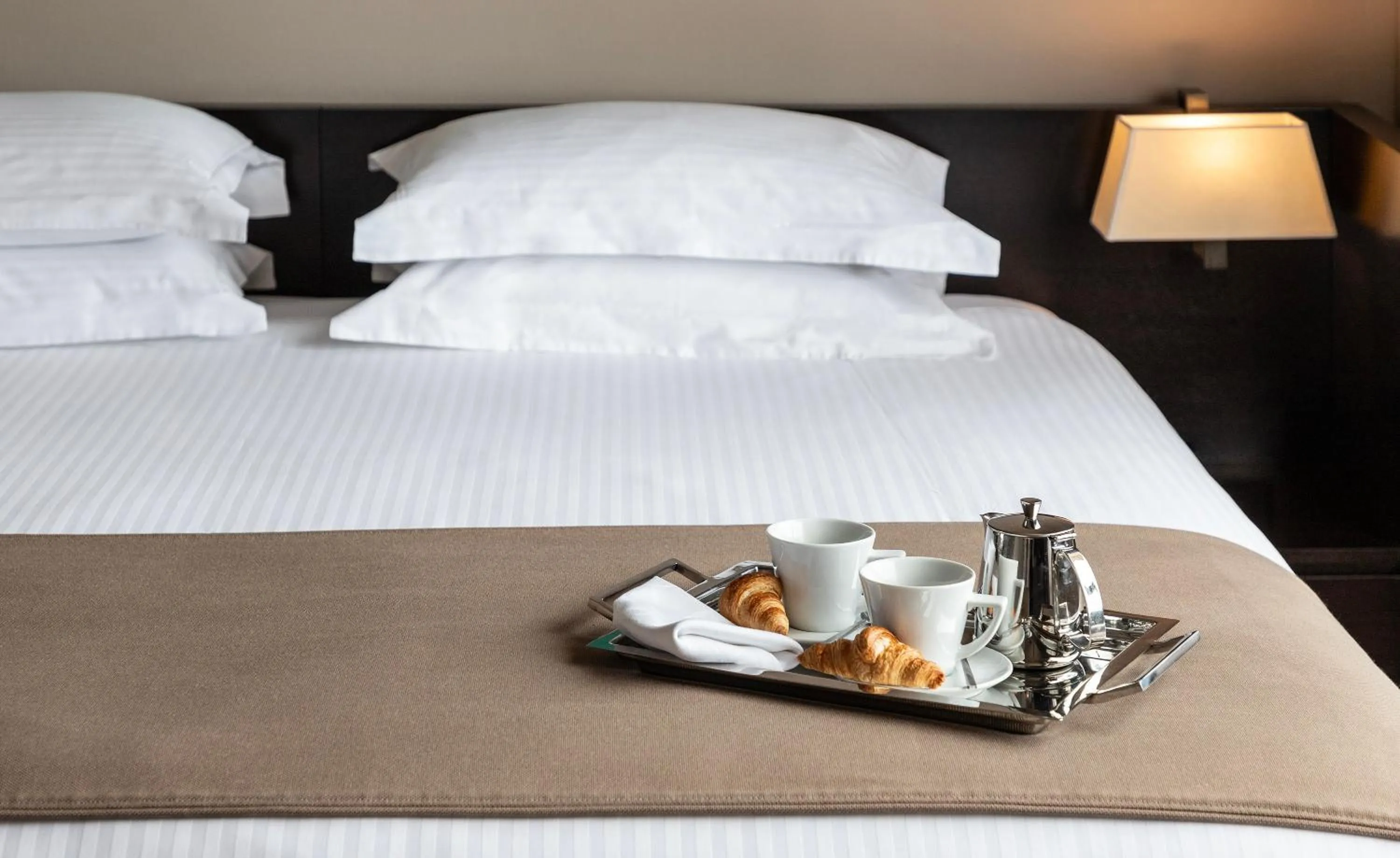 Bed in NJV Athens Plaza