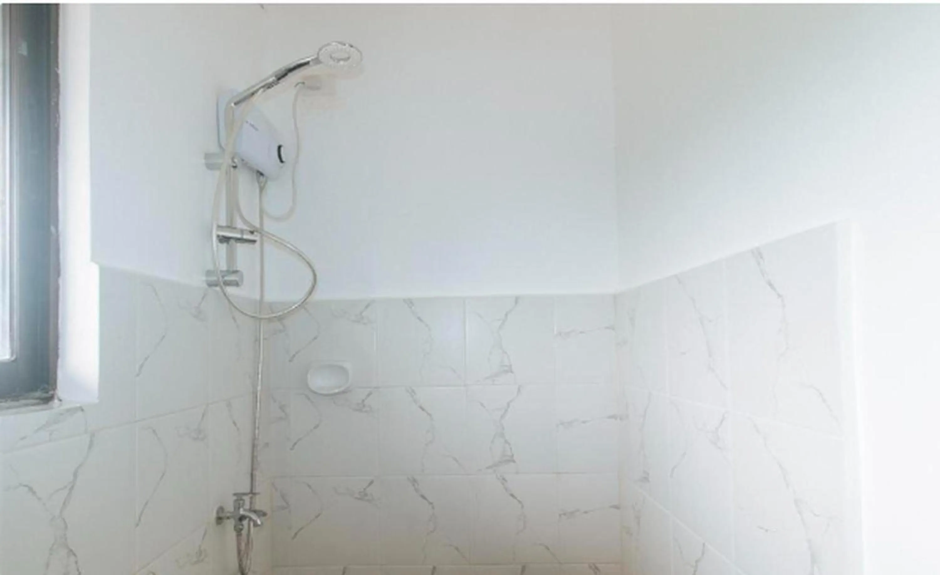 Bathroom in OYO 1087 Enrico's Place Kamias