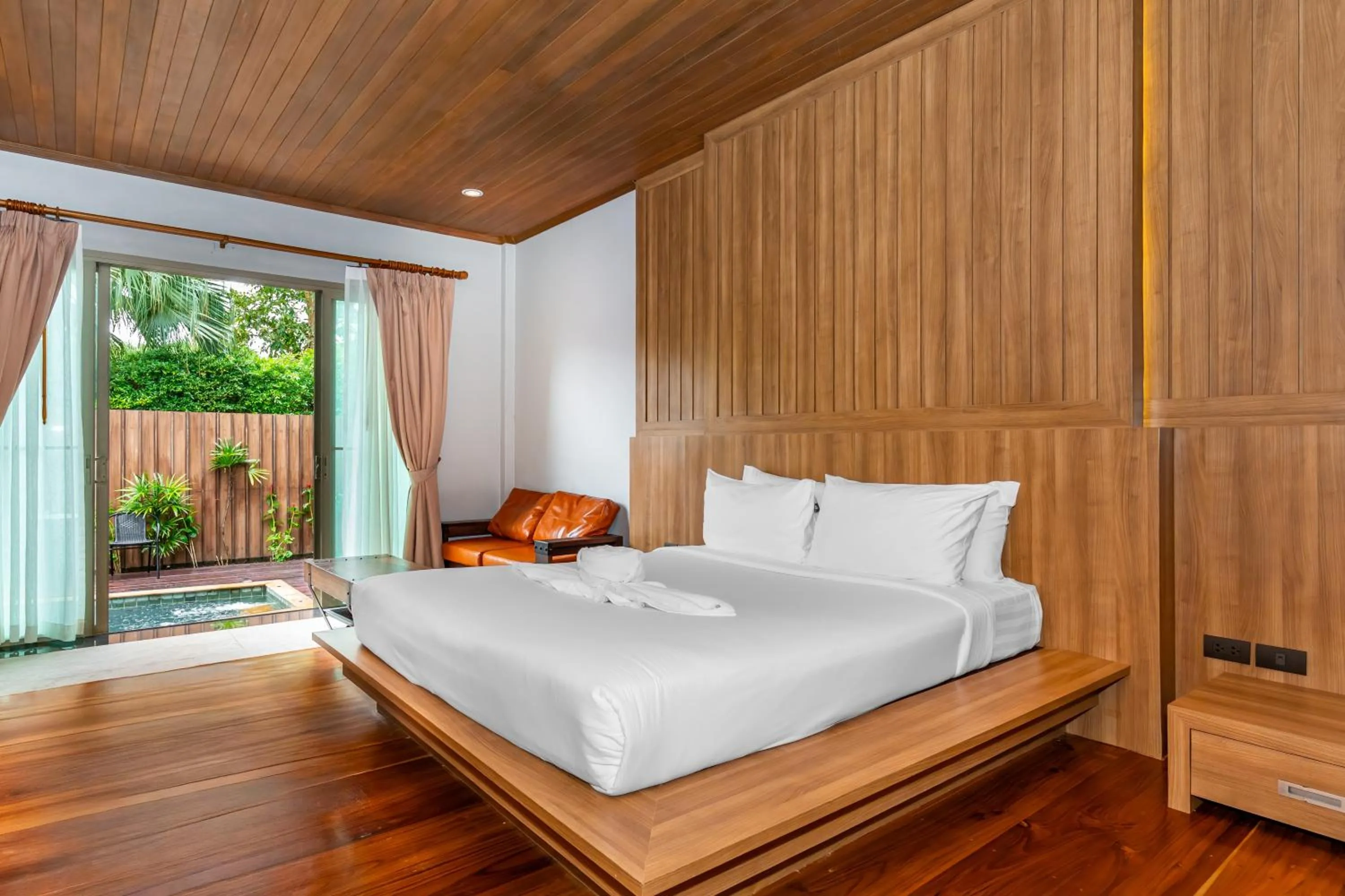 Bed in Malabar Pool Villa Phuket