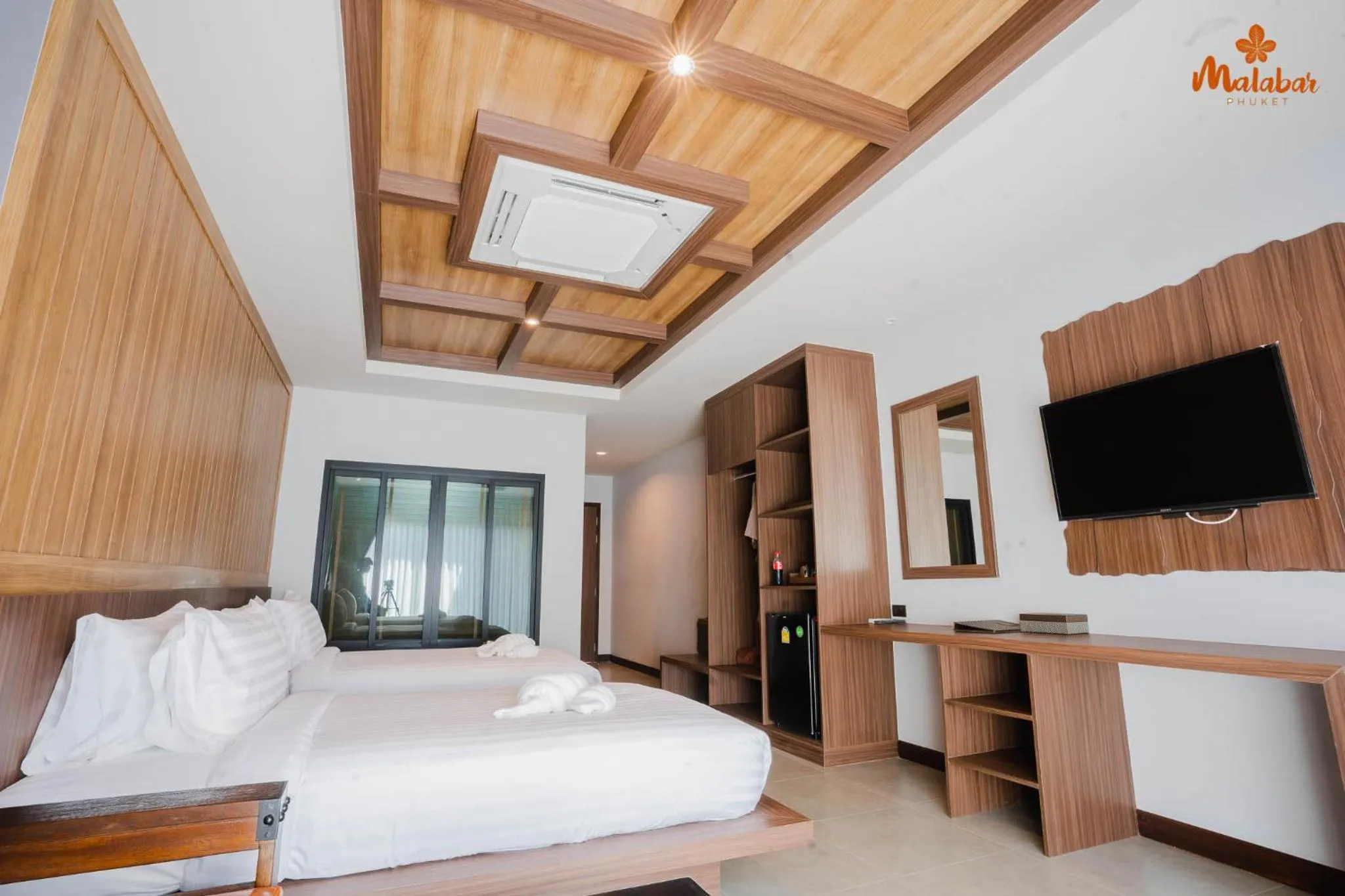 Bed in Malabar Pool Villa Phuket