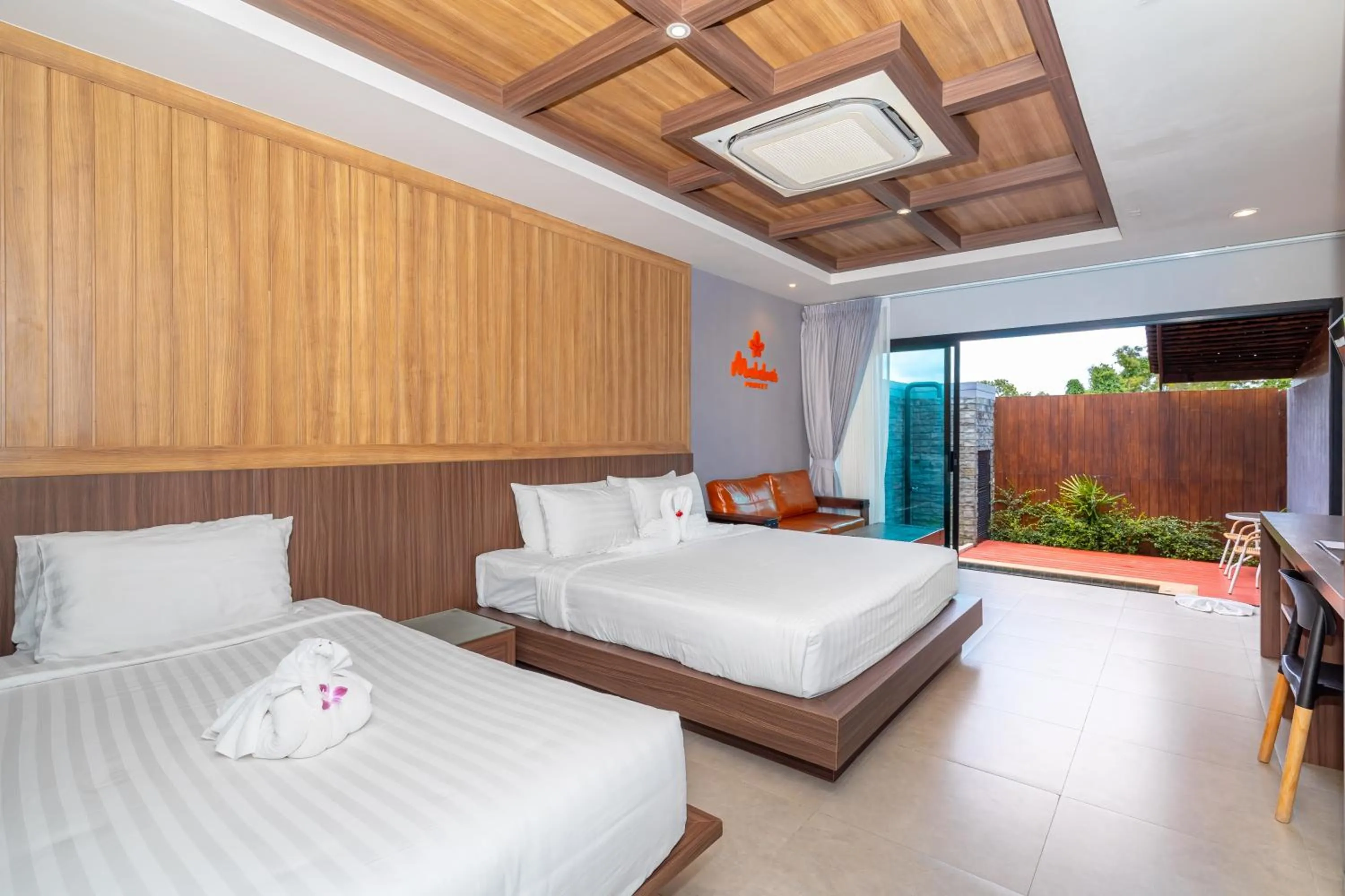 Bed in Malabar Pool Villa Phuket