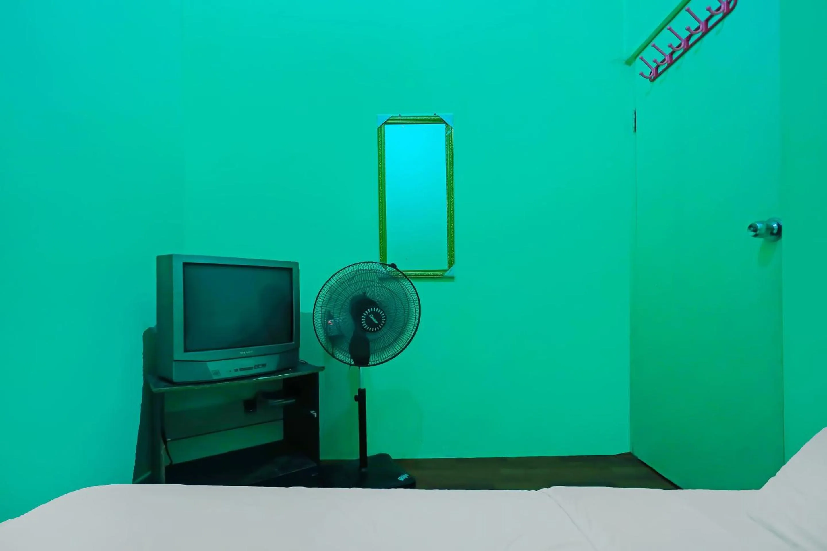 Bedroom in Hotel O Penginapan LorraNearPasar Oleh Oleh