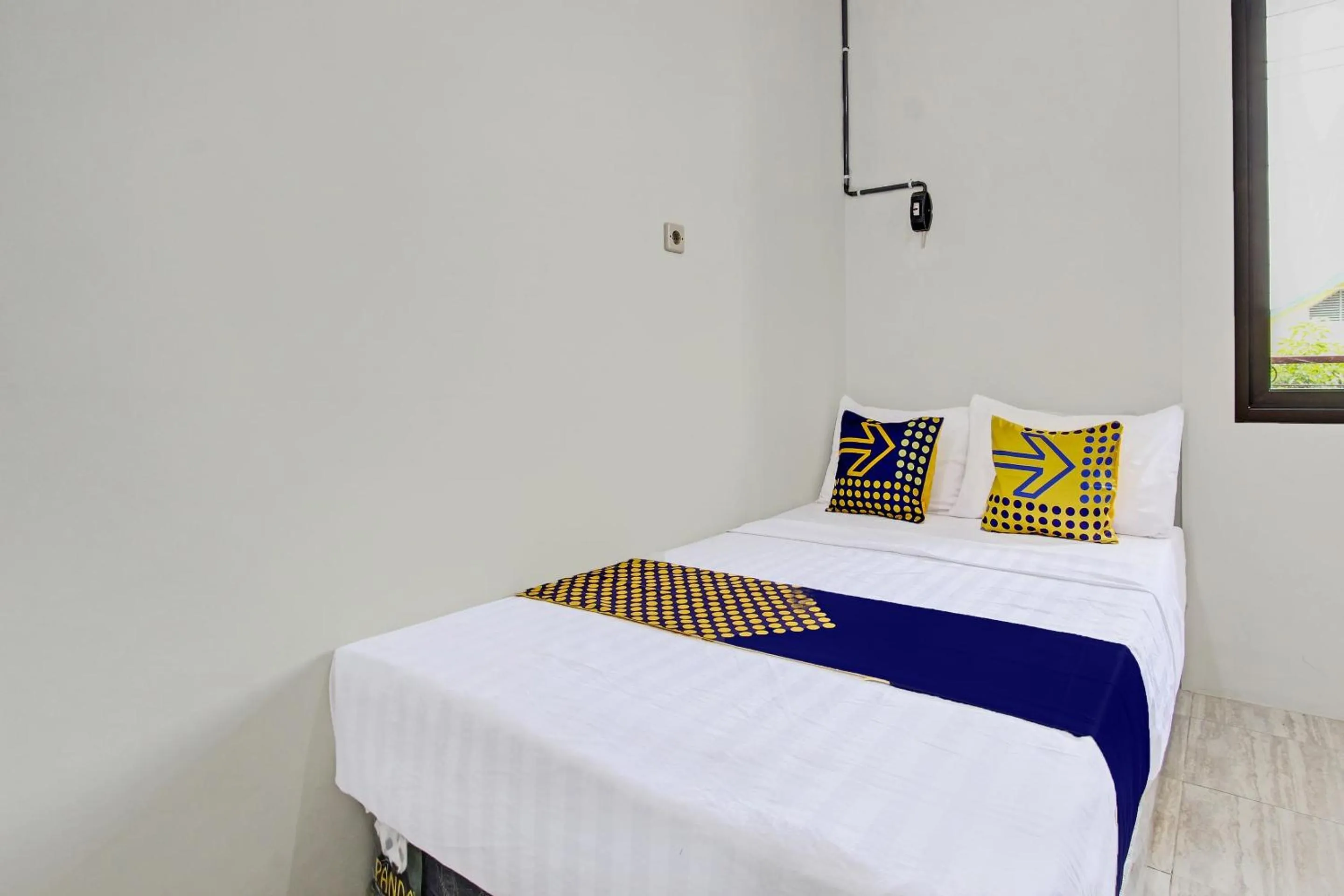 Bedroom, Bed in Hotel O Kristin Homestay