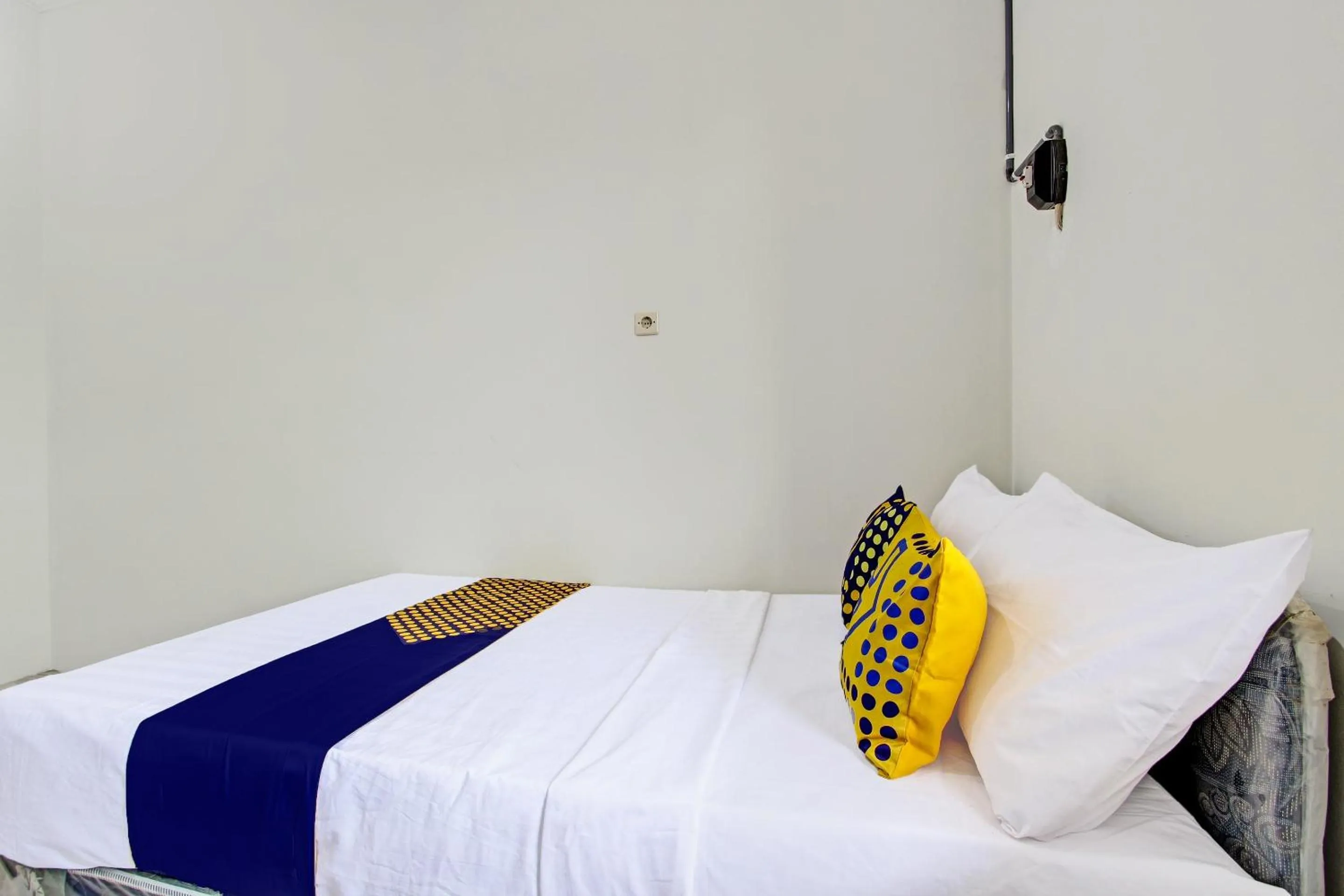 Bedroom, Bed in Hotel O Kristin Homestay