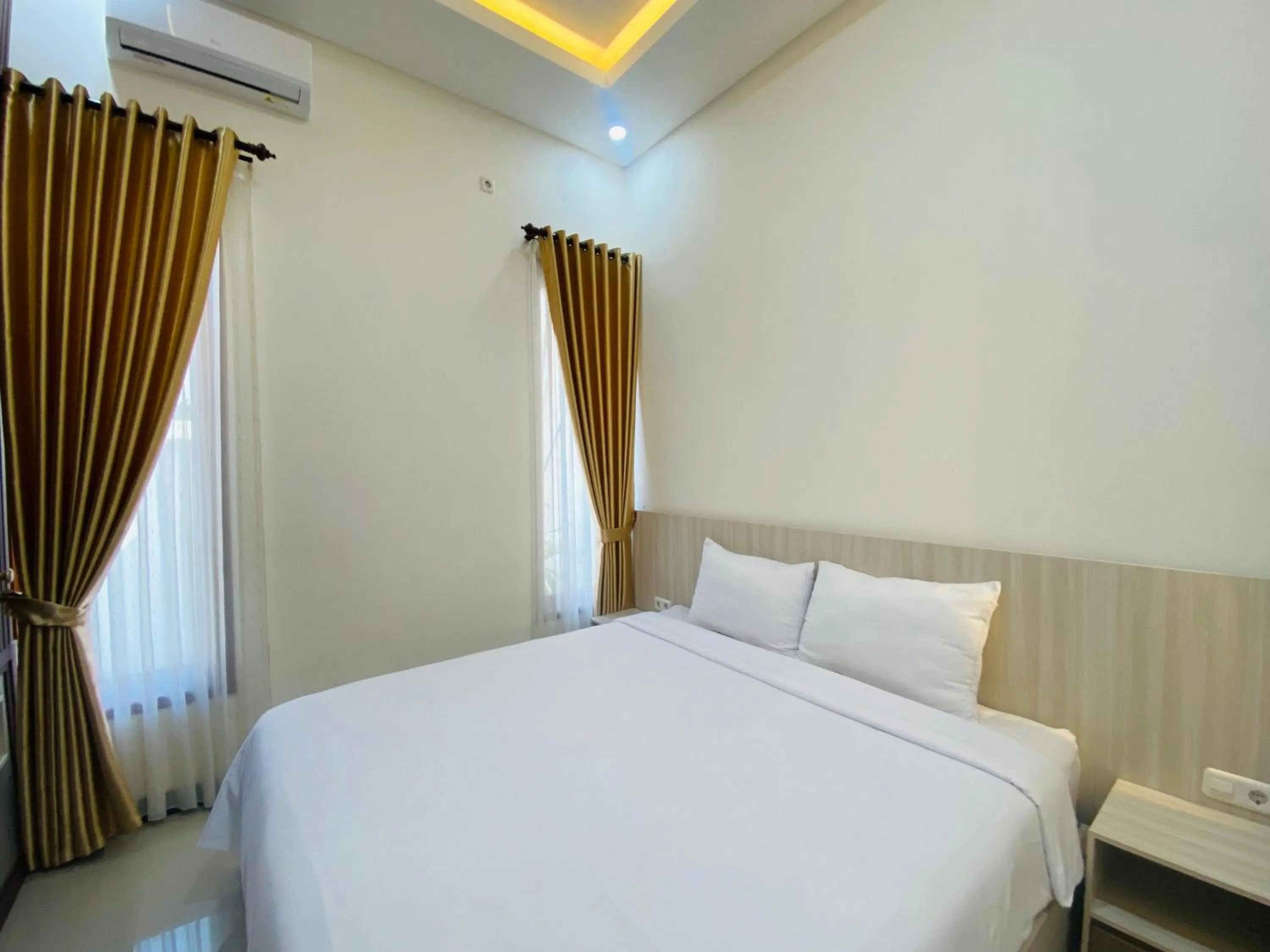 Bedroom, Bed in Kanggo Riko Family Homestay Mitra Reddoorz