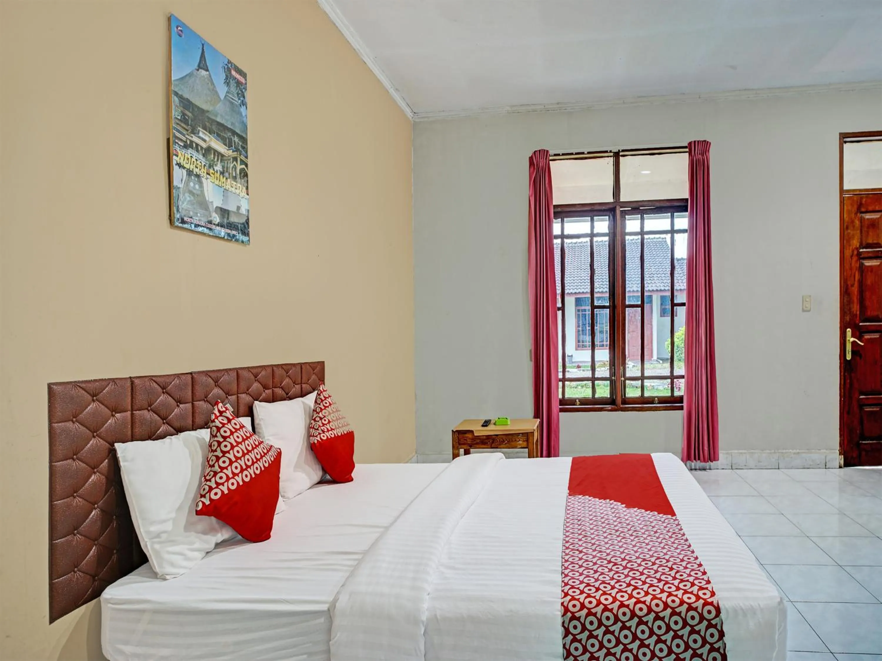 Bedroom in Capital O 92214 Beristera Hotel