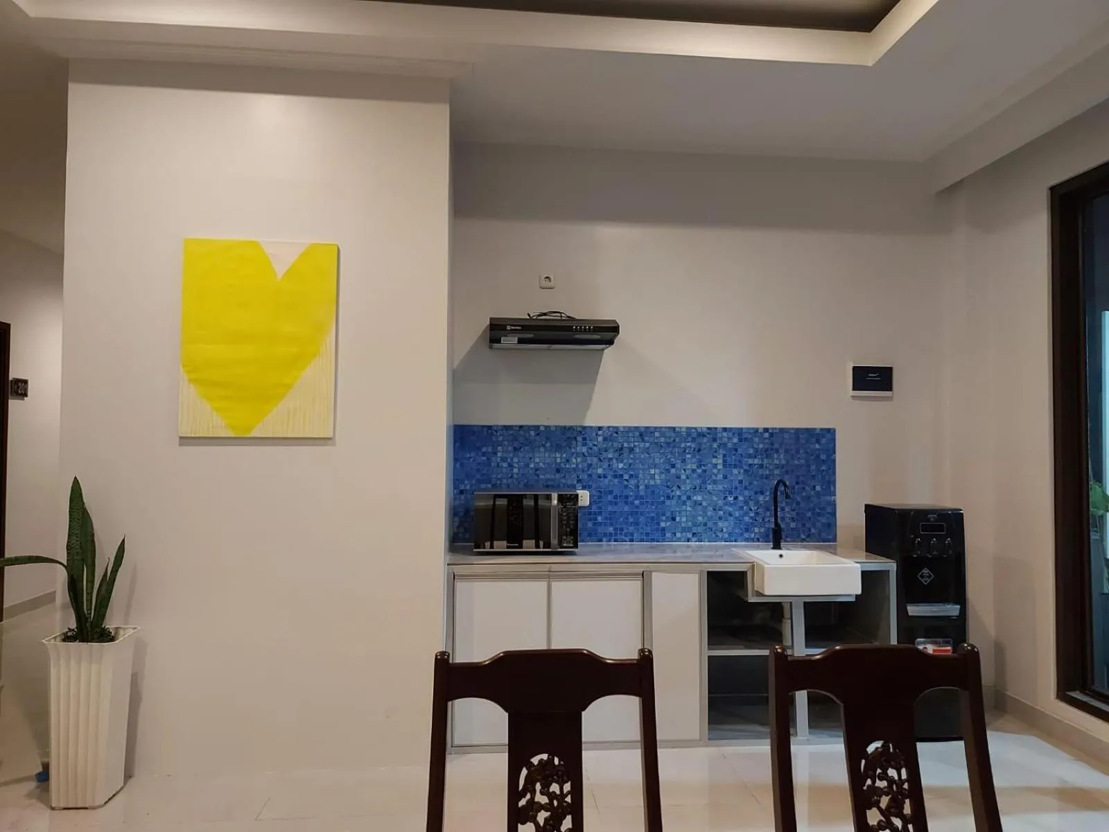 Kitchen or kitchenette in Atap Biru Residence