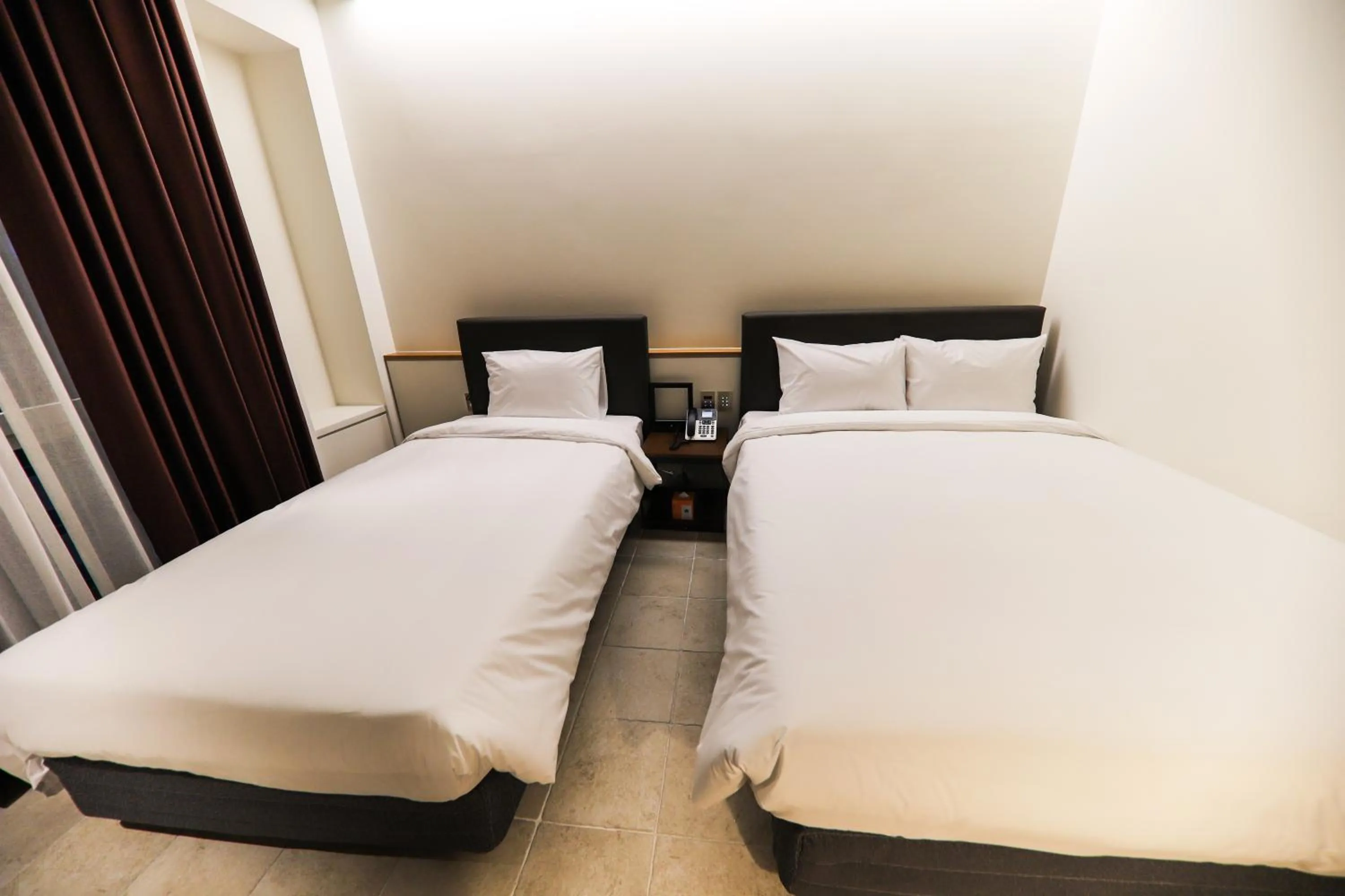 Bed in LE SEOUL HOTEL