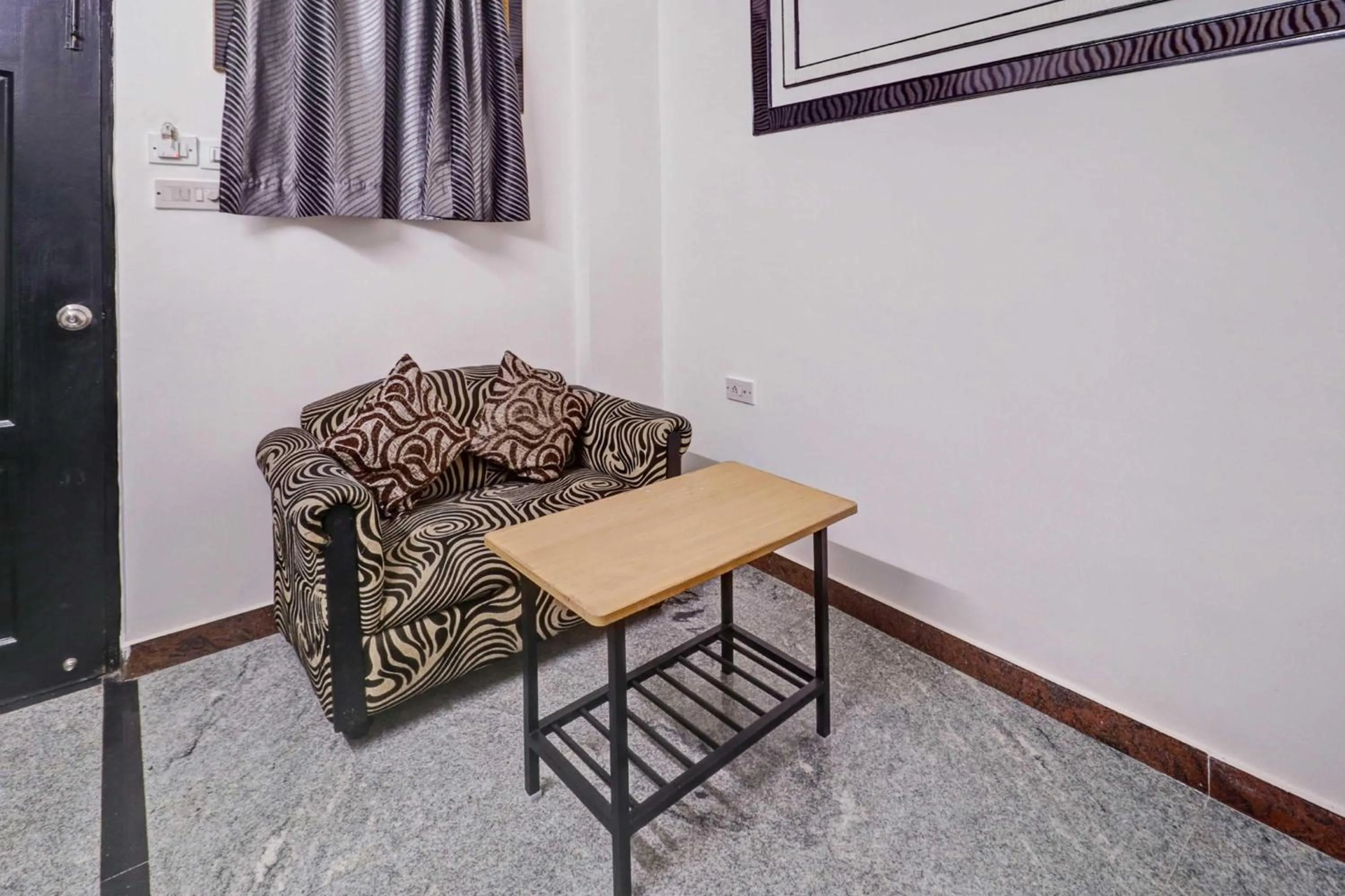 Bedroom in Super Collection O Sabharwal Residency Near Lalbagh Botanical Garden