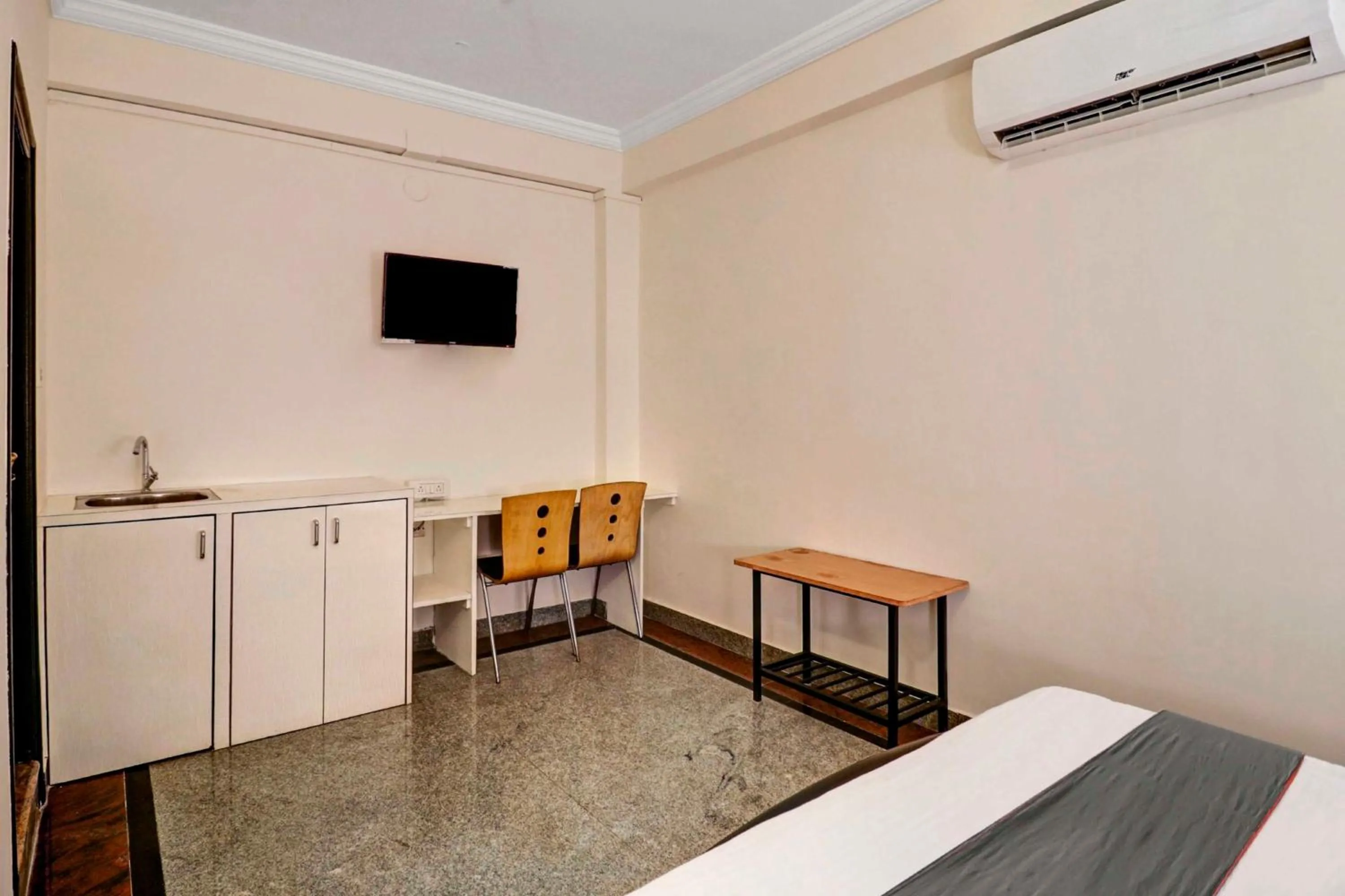 Bedroom in Super Collection O Sabharwal Residency Near Lalbagh Botanical Garden