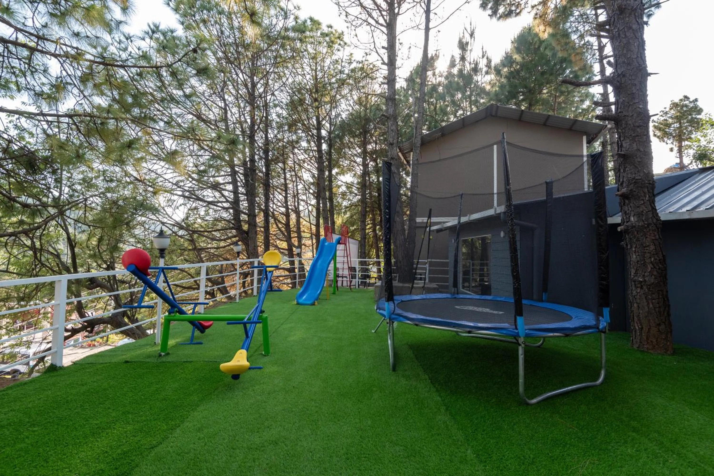 Children play ground in DLS Nature Trinket Resort - Dalhousie with Swimming Pool