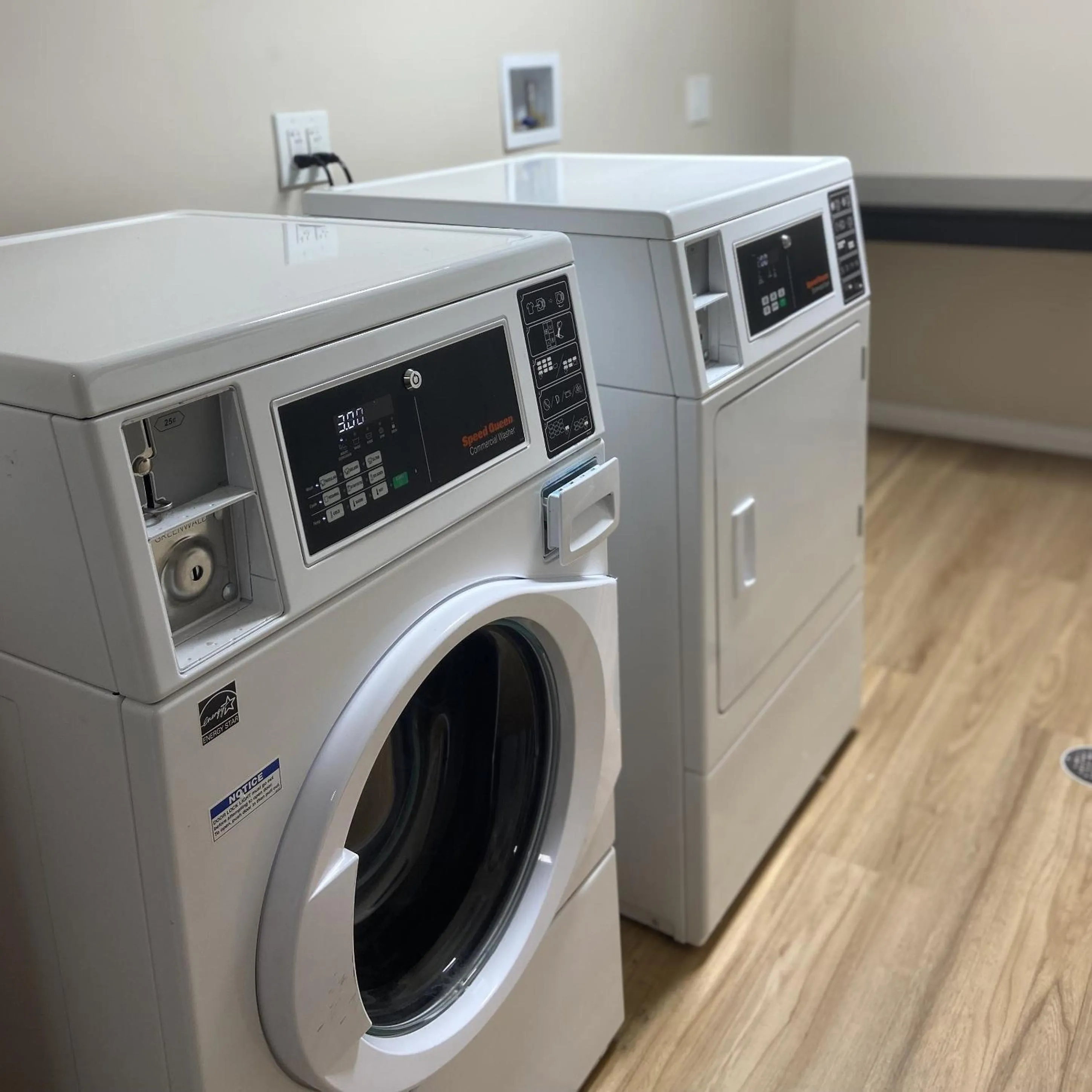 laundry in HomeTowne Studios by Red Roof Painted Post