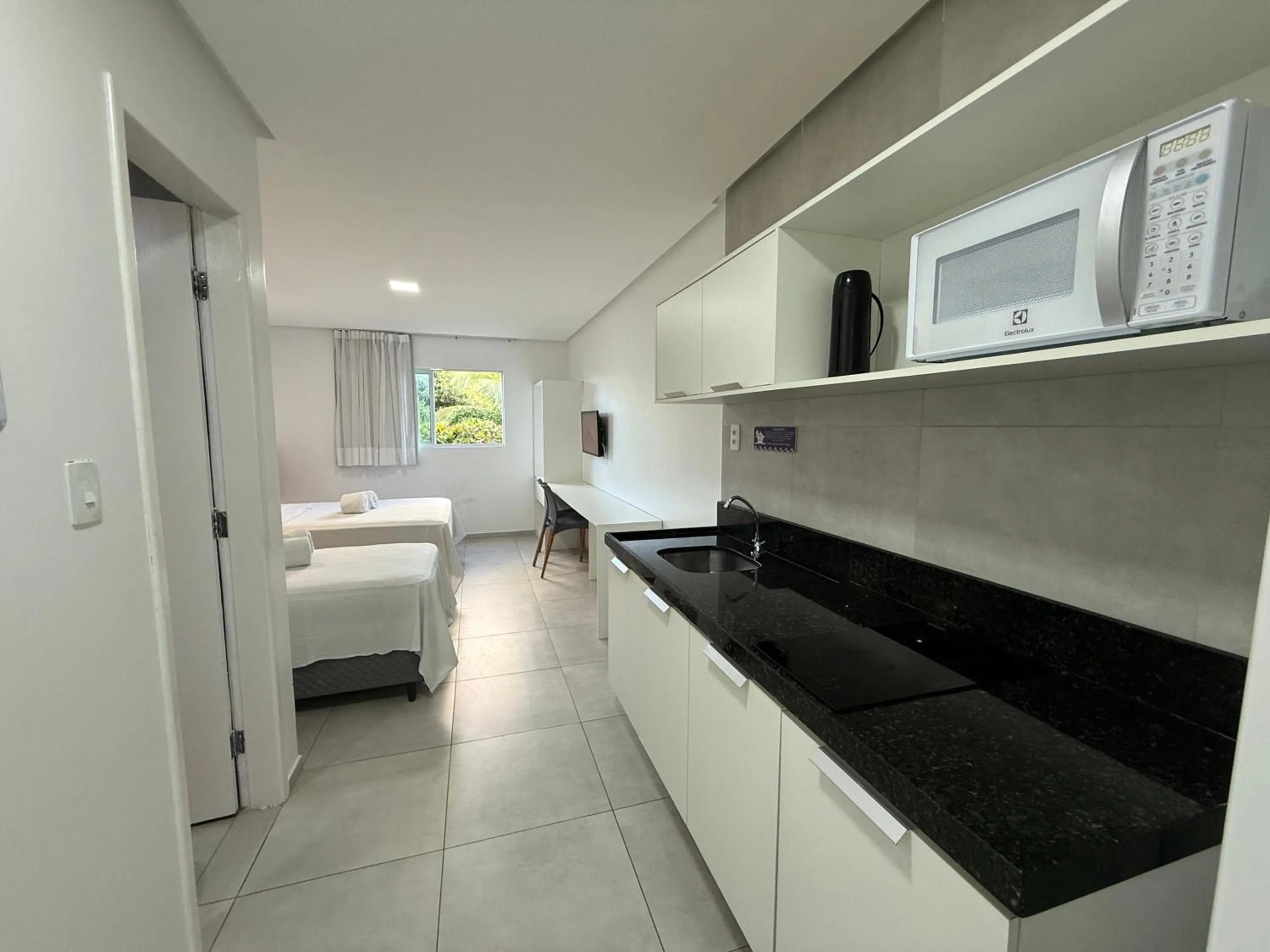 kitchen, Bed in Porto Vila by AFT